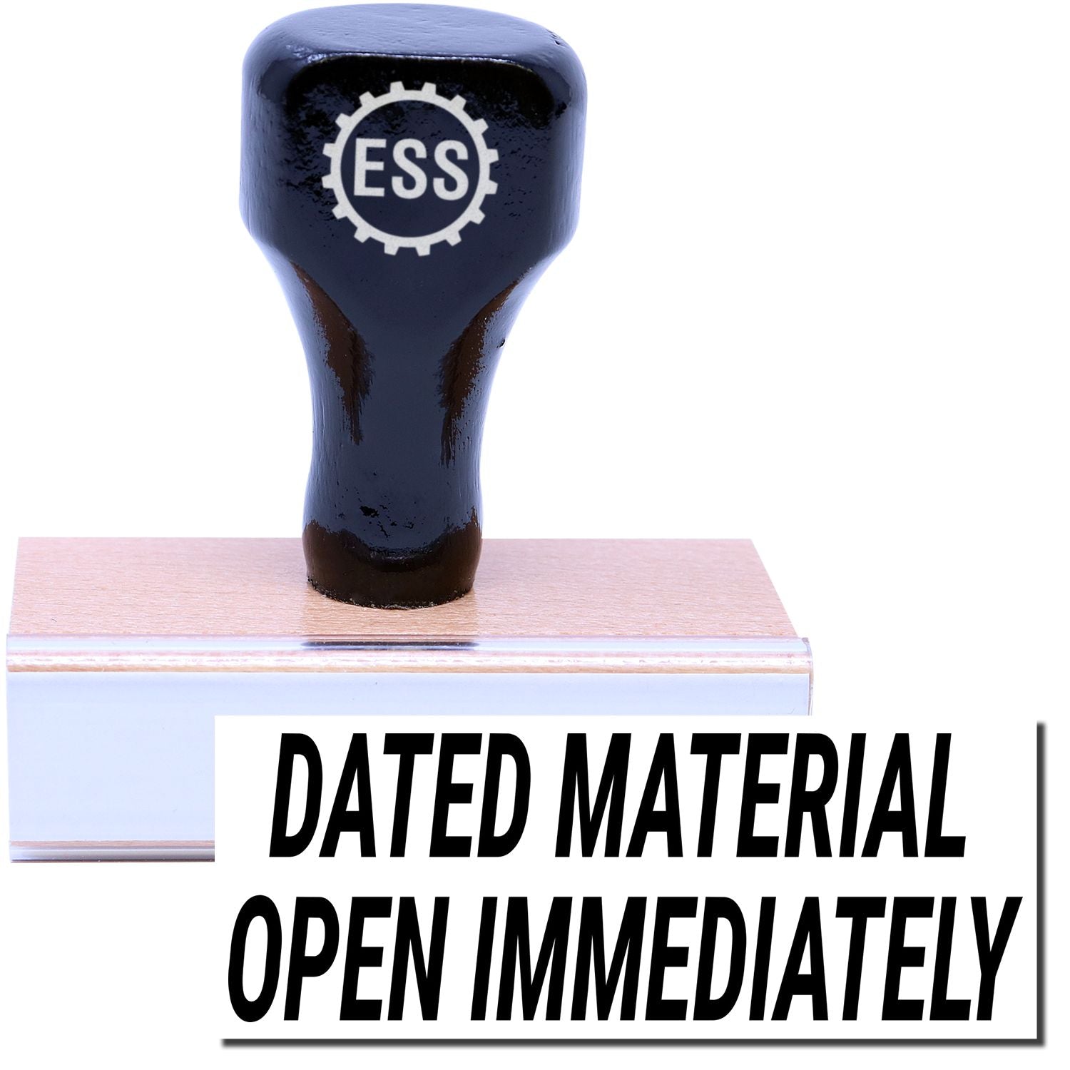 A stock office rubber stamp with a stamped image showing how the text DATED MATERIAL OPEN IMMEDIATELY is displayed after stamping.