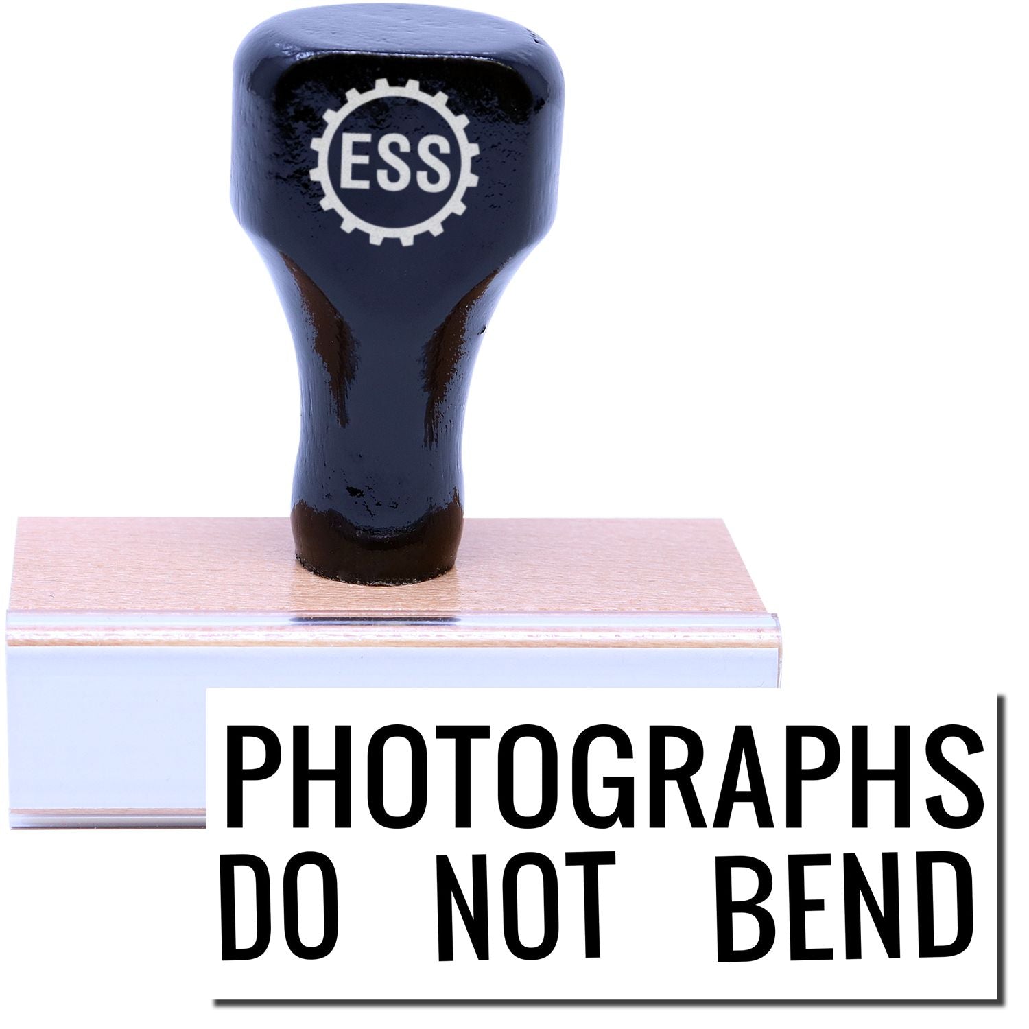 A stock office rubber stamp with a stamped image showing how the text PHOTOGRAPHS DO NOT BEND is displayed after stamping.