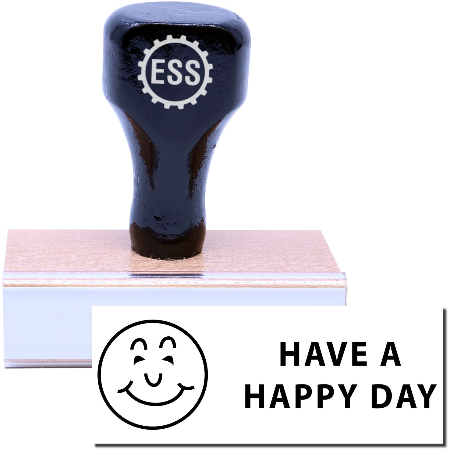 A stock office rubber stamp with a stamped image showing how the text HAVE A HAPPY DAY with a smiling face icon on the left side is displayed after stamping.