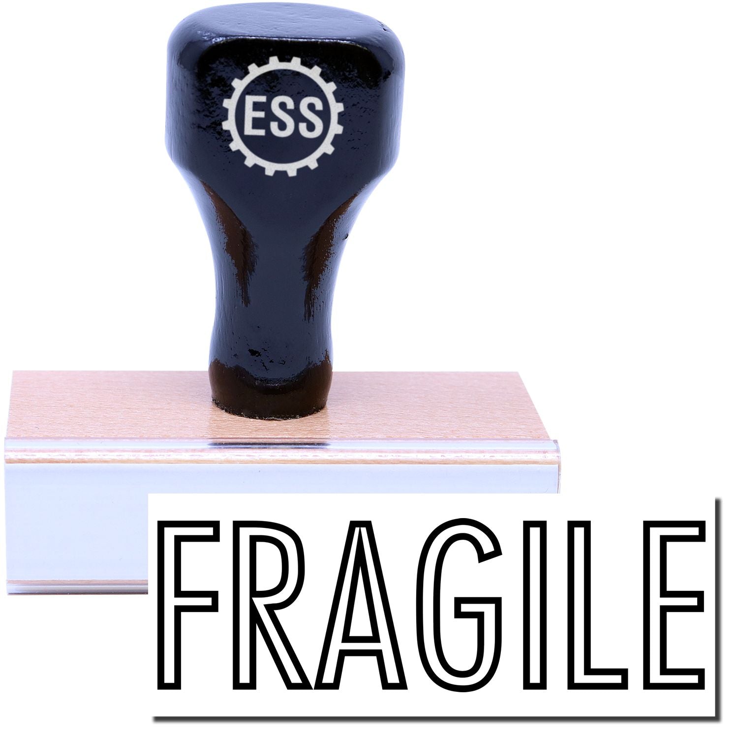 A stock office rubber stamp with a stamped image showing how the text FRAGILE in a large outline font is displayed after stamping.