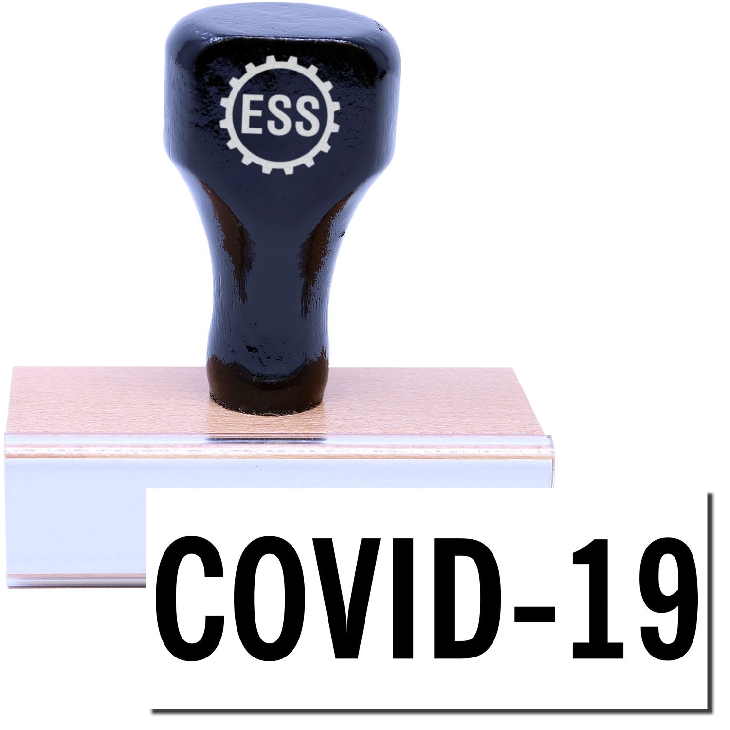 A stock office rubber stamp with a stamped image showing how the text COVID-19 in a large bold font is displayed after stamping.