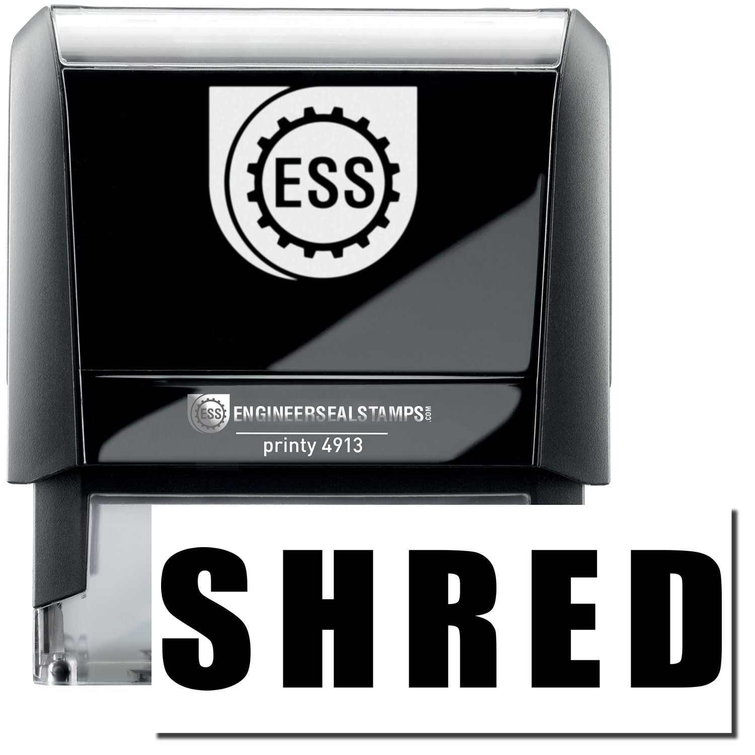 A self-inking stamp with a stamped image showing how the text SHRED in a large bold font is displayed by it after stamping.