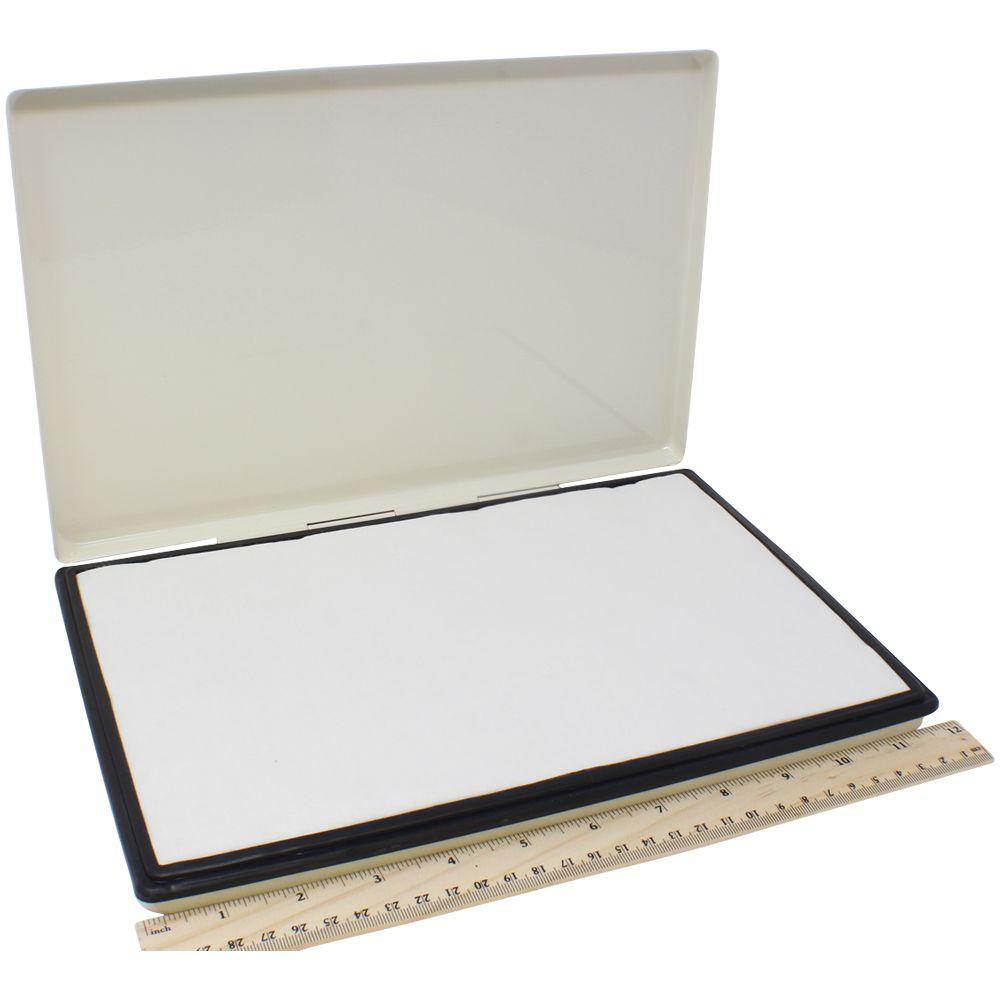 Industrial Rubber Stamp Pad-12 (Size: 6 x 12) with an open lid, showing the white pad surface, placed next to a ruler for scale.