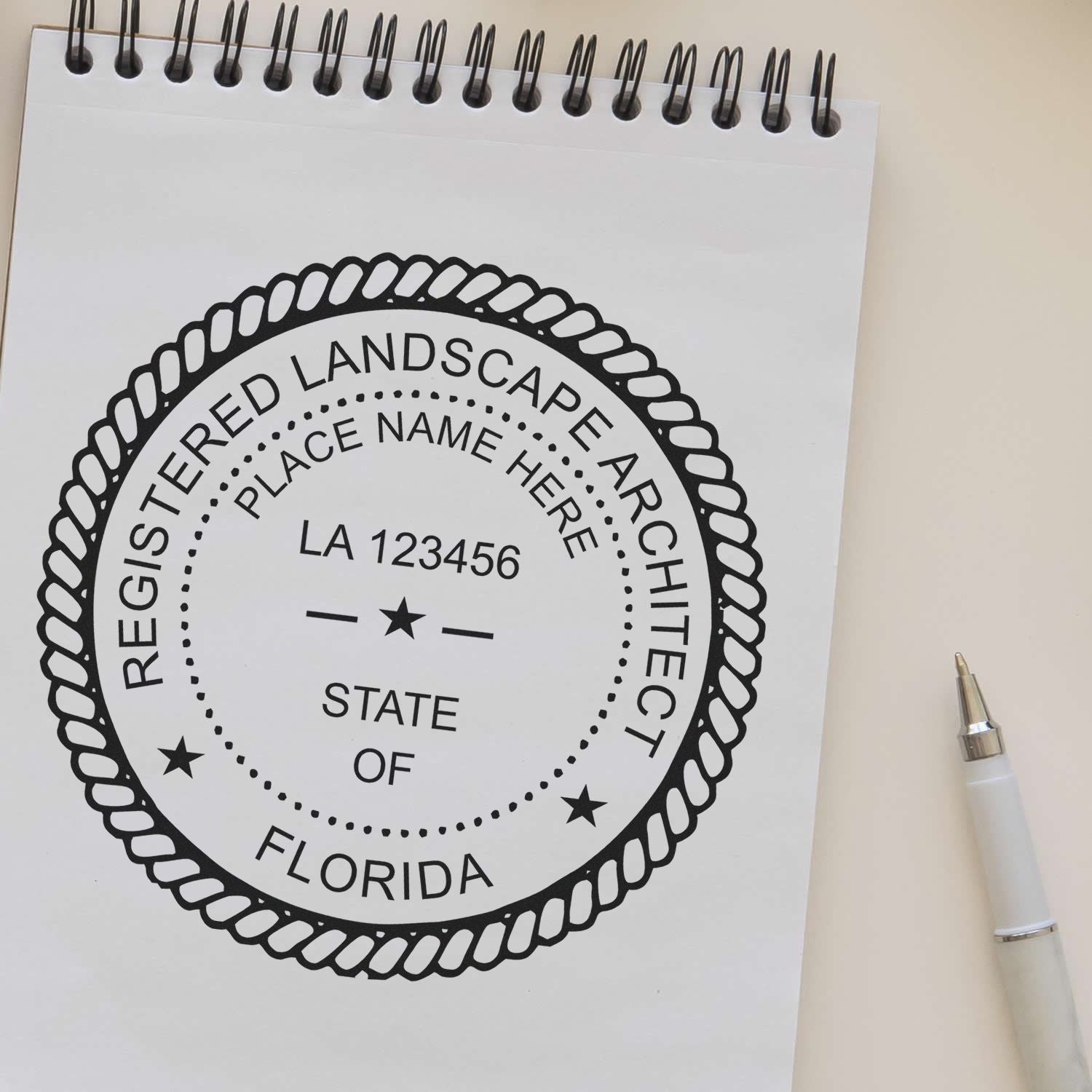 A stamped impression of the Self-Inking Florida Landscape Architect Stamp in this stylish lifestyle photo, setting the tone for a unique and personalized product.