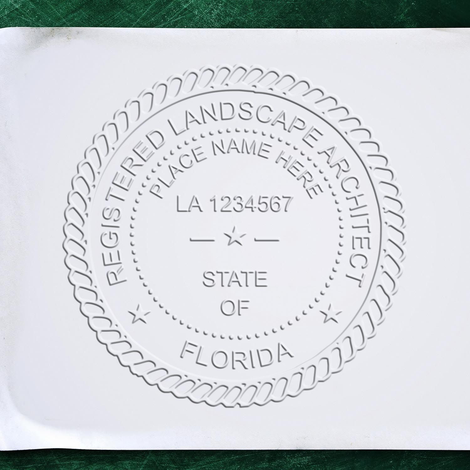 Another Example of a stamped impression of the State of Florida Extended Long Reach Landscape Architect Seal Embosser on a piece of office paper.