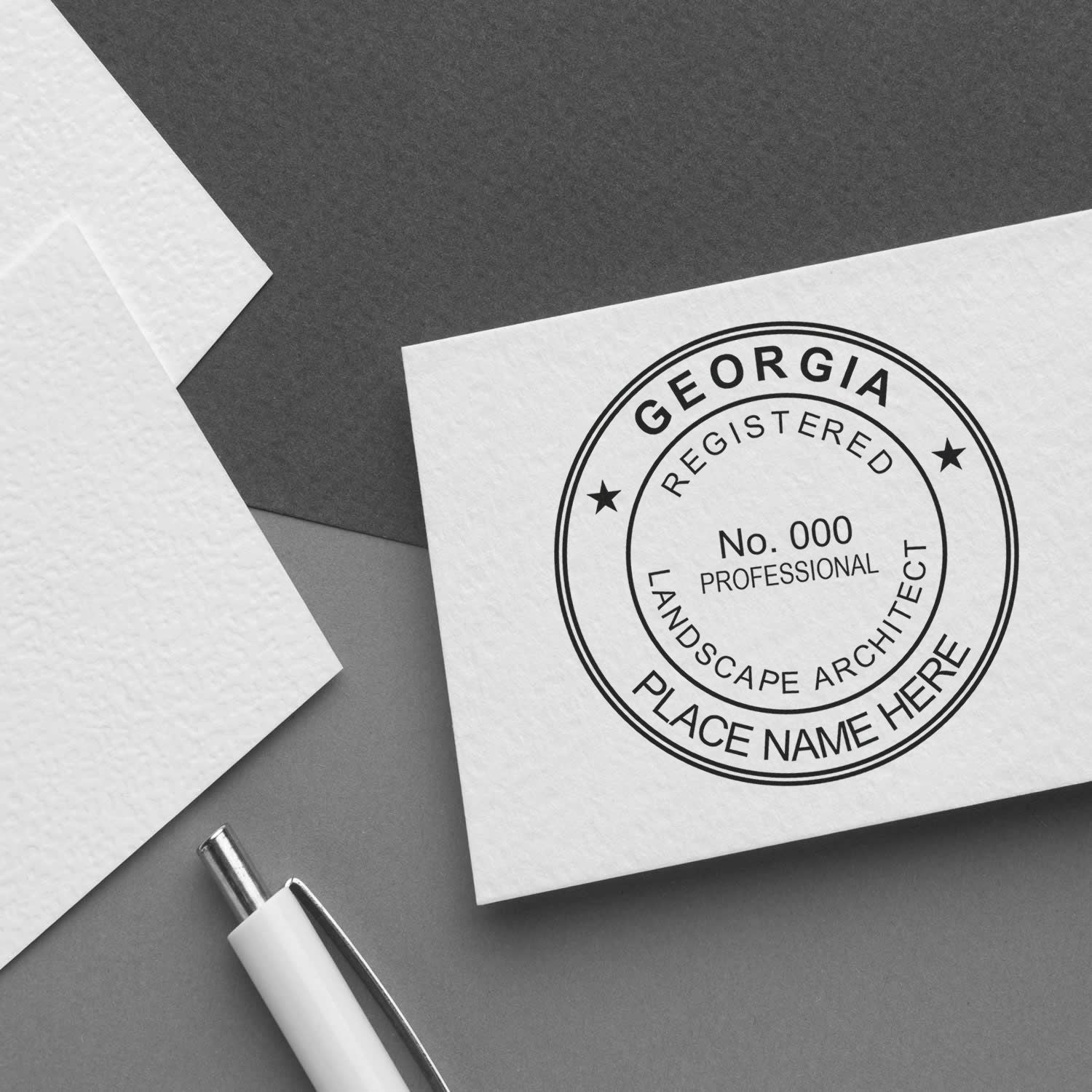 A stamped impression of the Self-Inking Georgia Landscape Architect Stamp in this stylish lifestyle photo, setting the tone for a unique and personalized product.