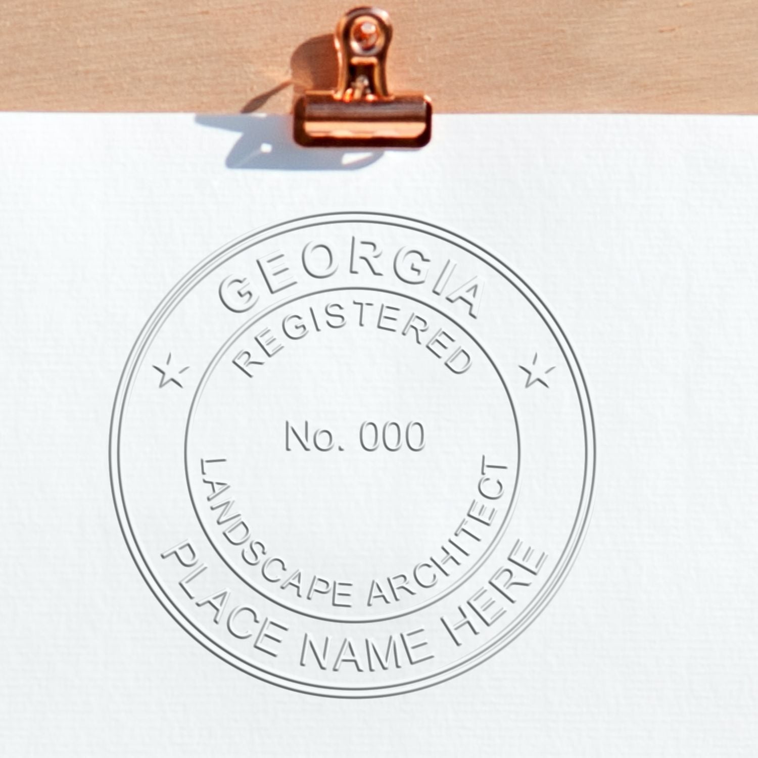 A photograph of the State of Georgia Handheld Landscape Architect Seal stamp impression reveals a vivid, professional image of the on paper.