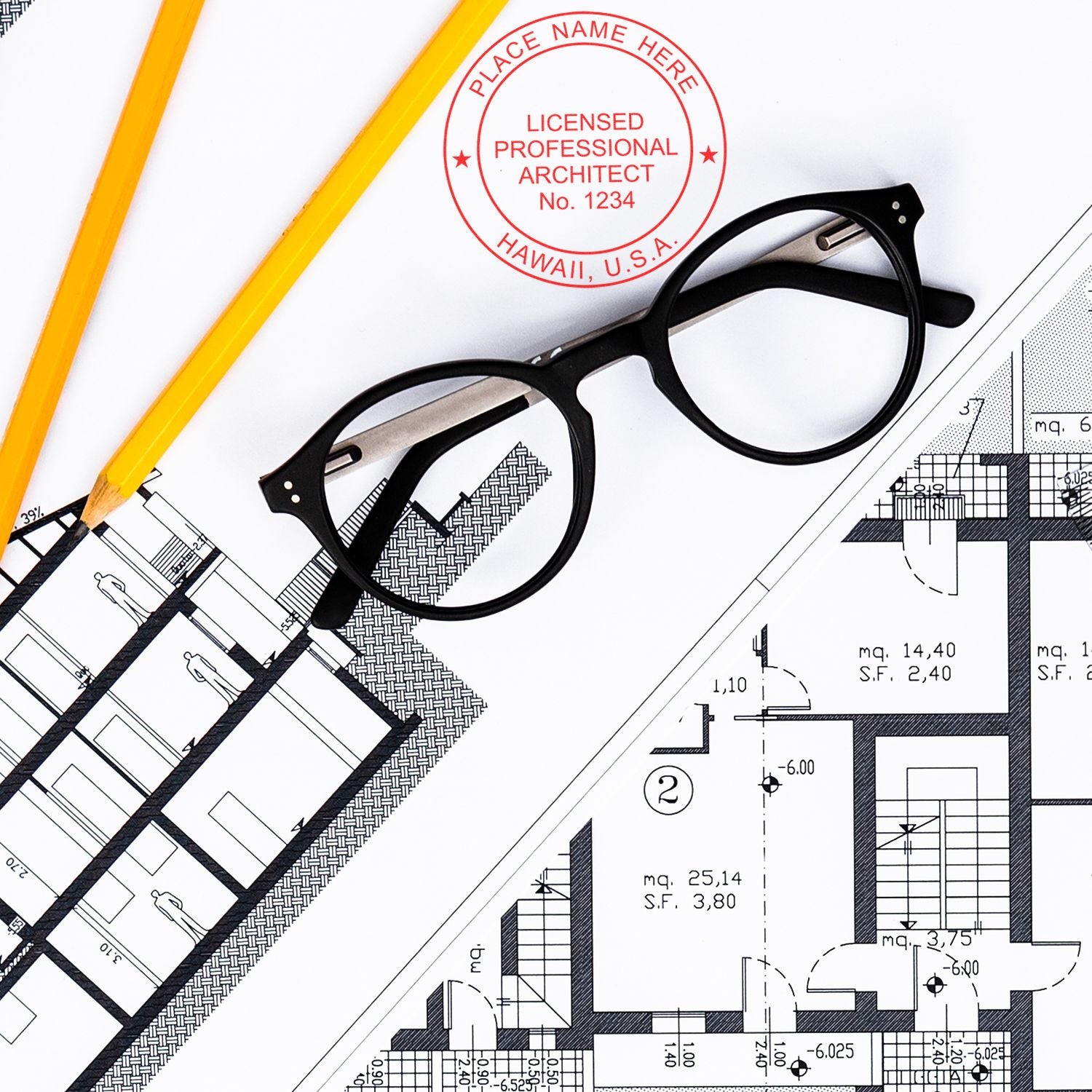 Hawaii Architect Seal Stamp in use on architectural blueprints, with glasses and pencils nearby.