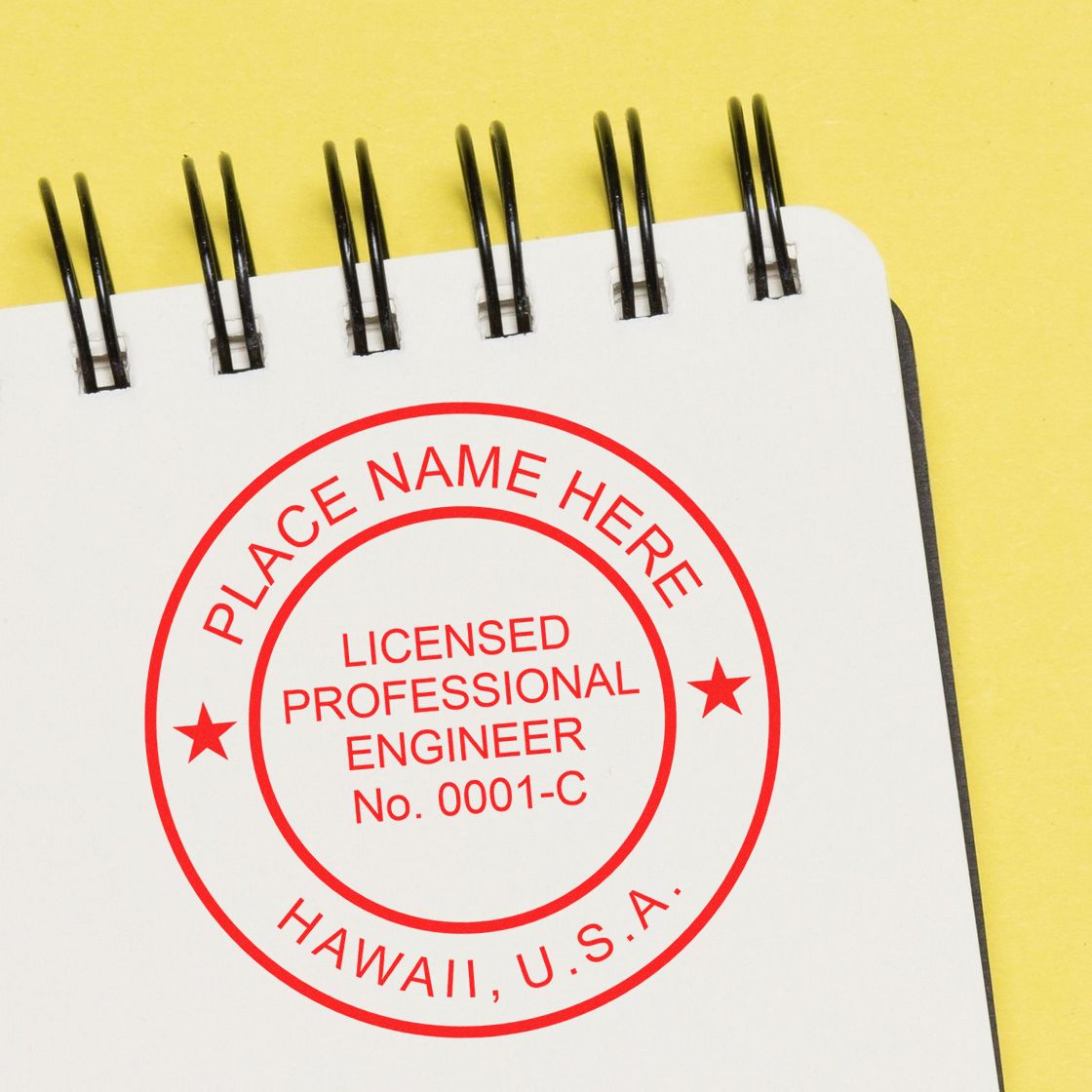 A lifestyle photo showing a stamped image of the Hawaii Professional Engineer Seal Stamp on a piece of paper