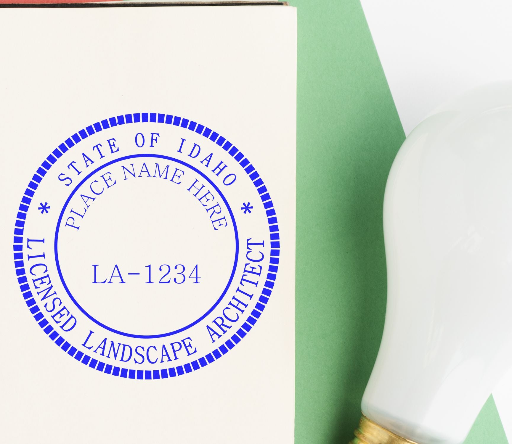 This paper is stamped with a sample imprint of the Self-Inking Idaho Landscape Architect Stamp, signifying its quality and reliability.