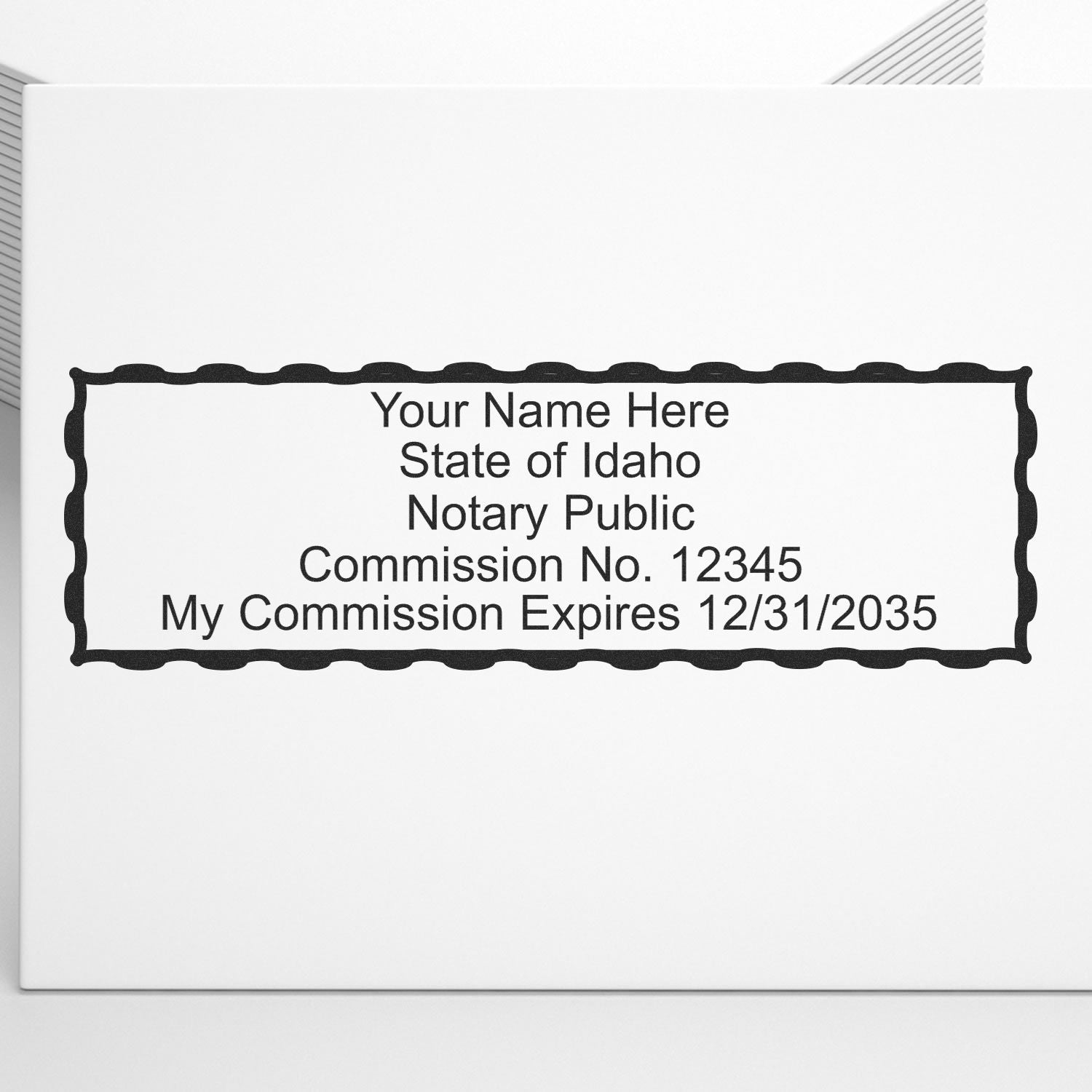 The Slim Pre-Inked Rectangular Notary Stamp for Idaho stamp impression comes to life with a crisp, detailed photo on paper - showcasing true professional quality.