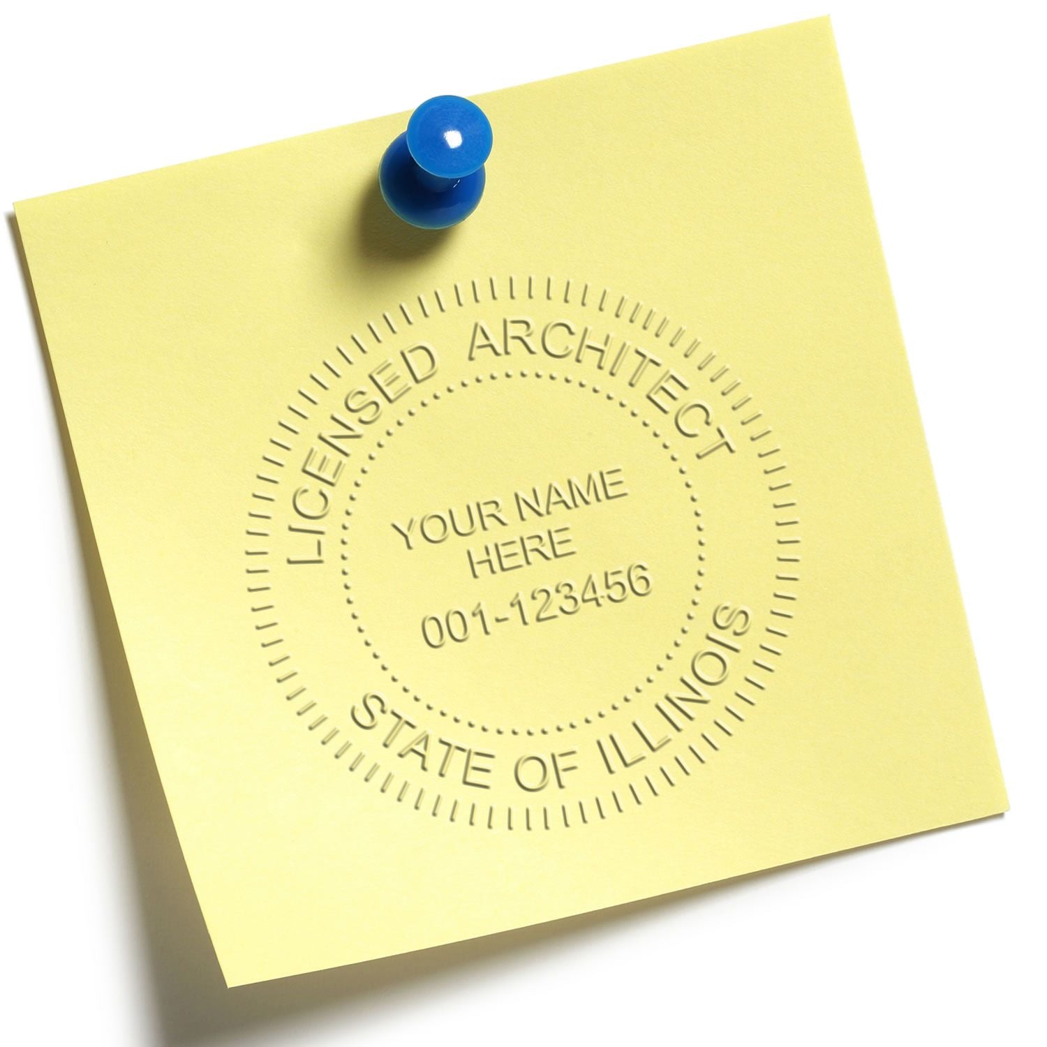 An in use photo of the Gift Illinois Architect Seal showing a sample imprint on a cardstock