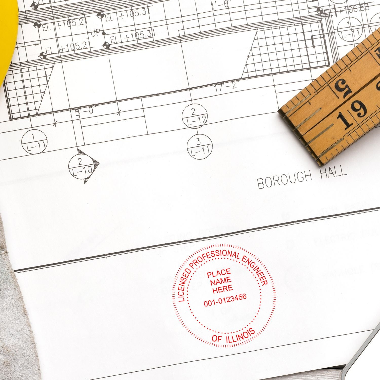 An alternative view of the Digital Illinois PE Stamp and Electronic Seal for Illinois Engineer stamped on a sheet of paper showing the image in use