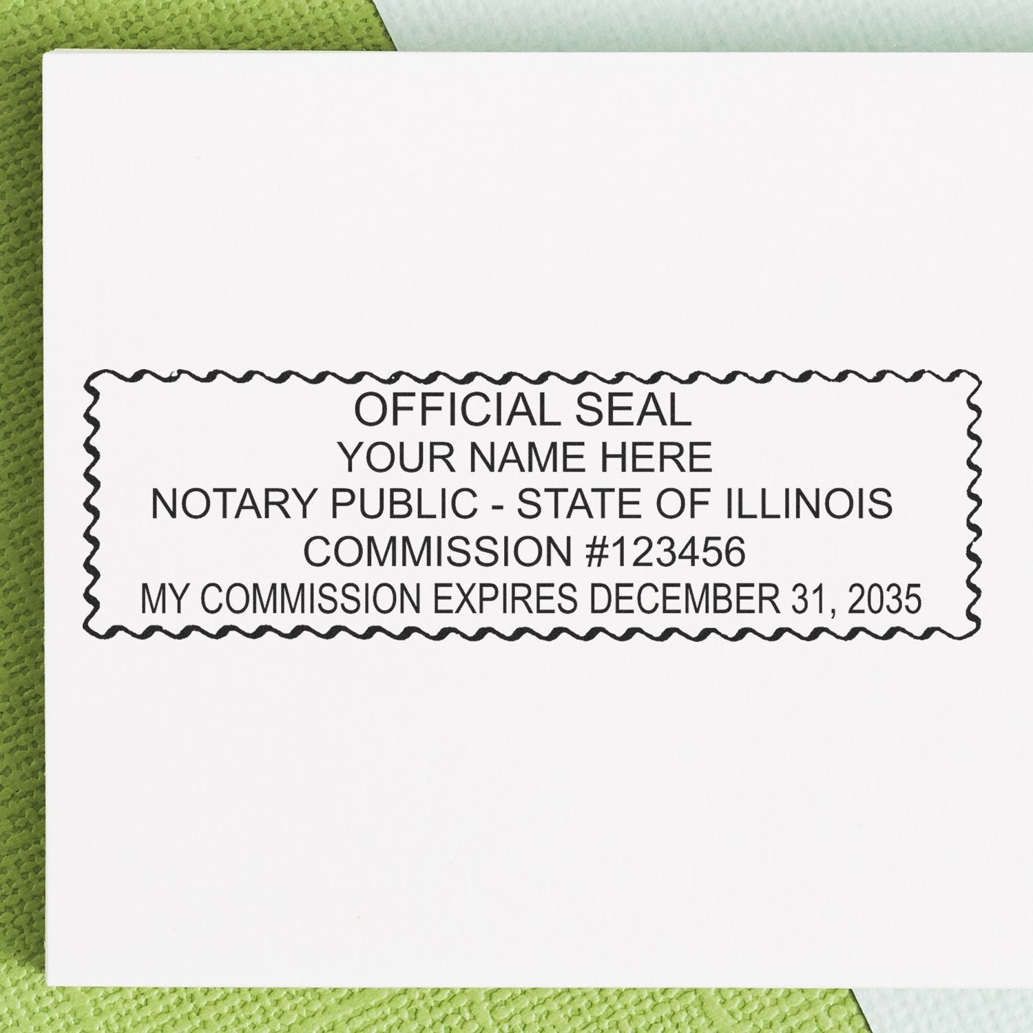 A lifestyle photo showing a stamped image of the Wooden Handle Illinois Rectangular Notary Public Stamp on a piece of paper