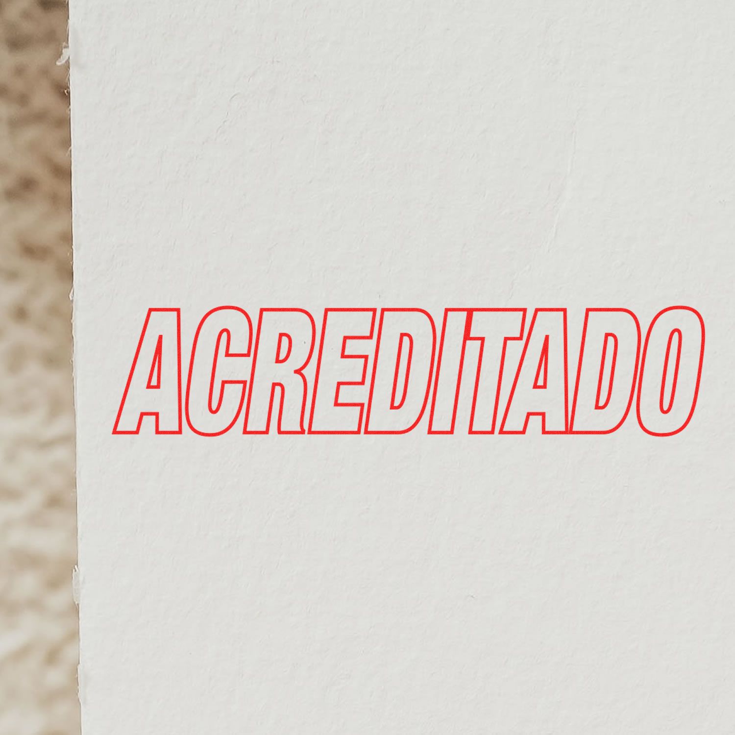 Red 'ACREDITADO' text stamped on white paper using the Self Inking Acreditado Stamp.