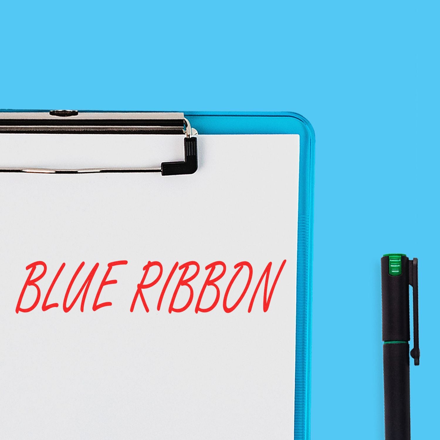 Self Inking Blue Ribbon Stamp imprint on white paper on a blue clipboard, with a black pen beside it, against a blue background.