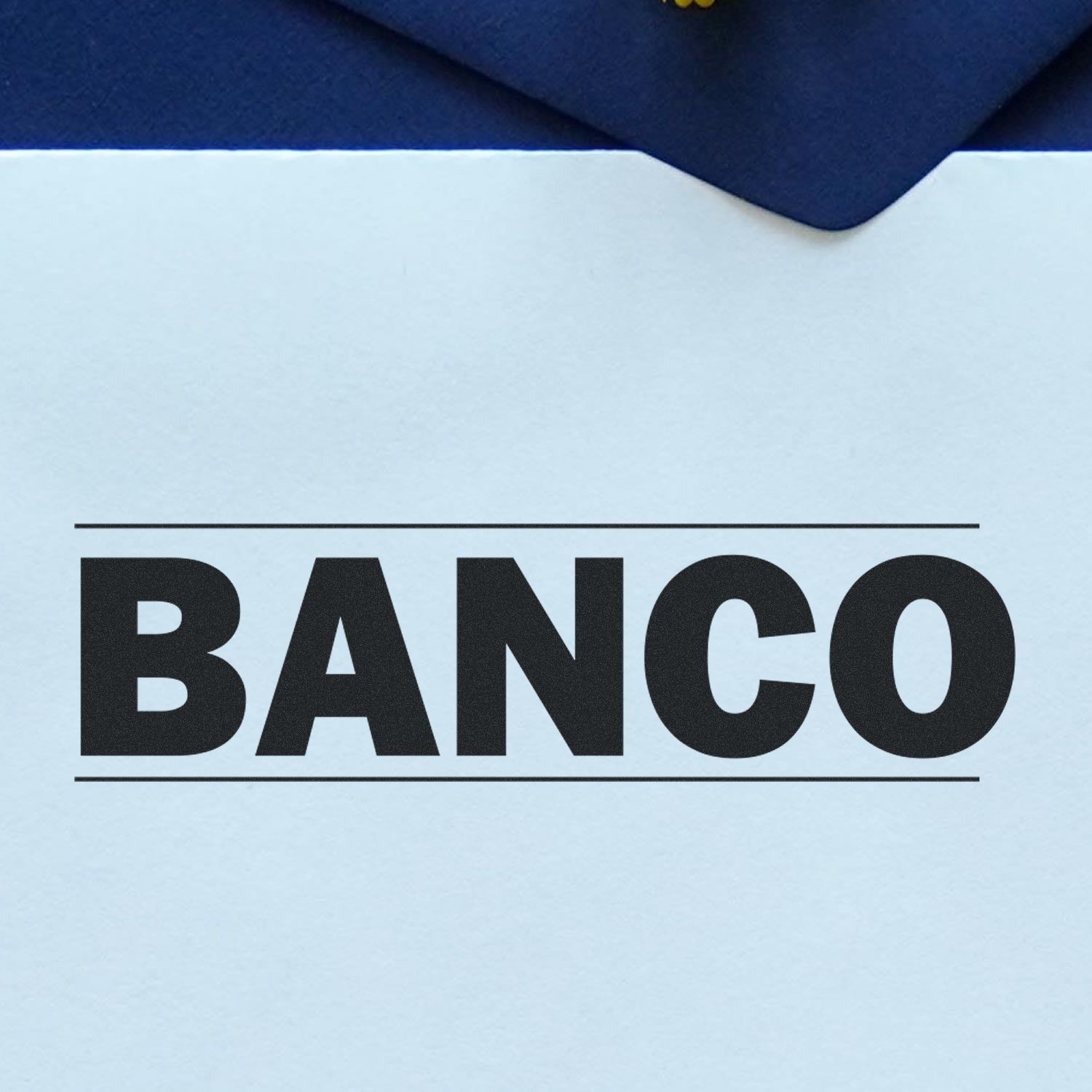 Bold Banco Rubber Stamp imprint on a white paper, with the word BANCO in large, bold black letters, underlined above and below.