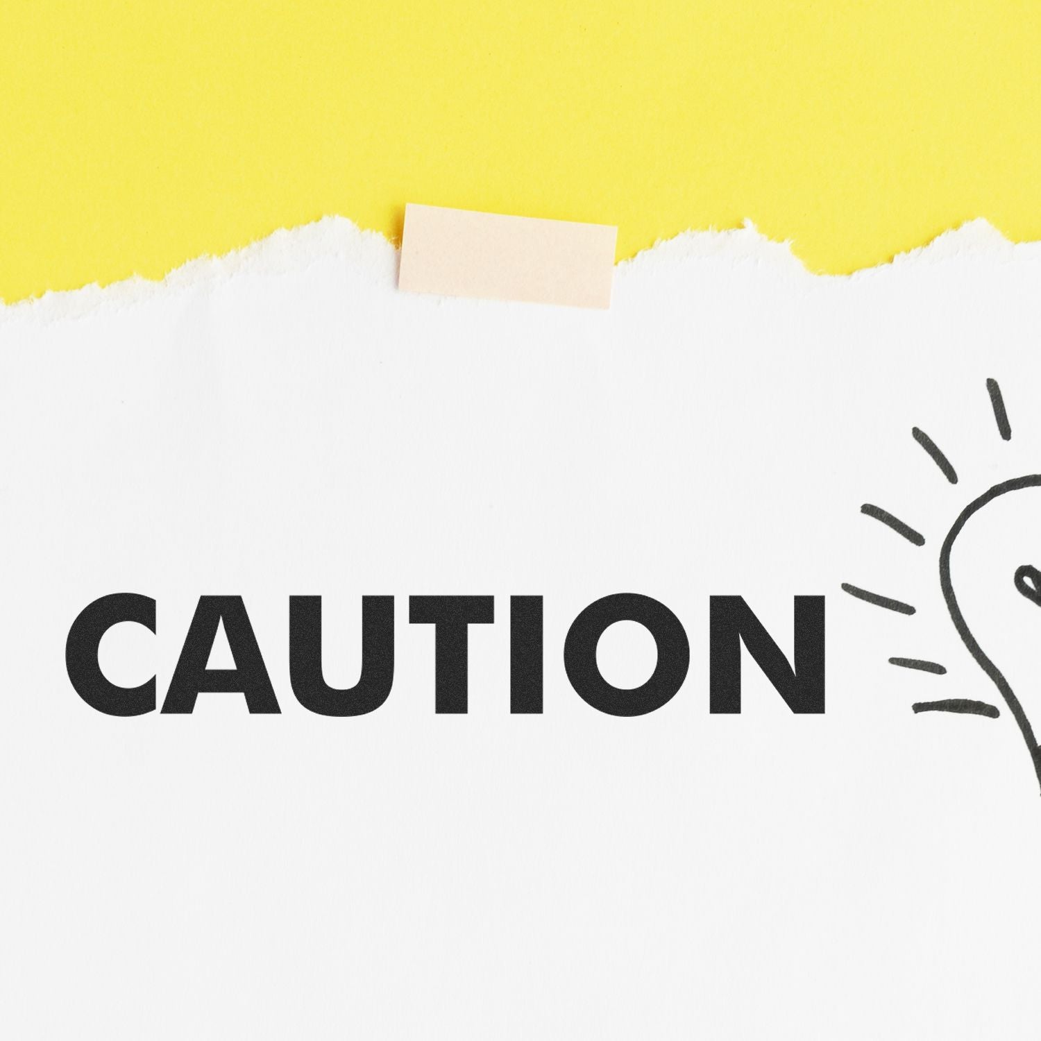 Caution Rubber Stamp used on white paper with a yellow background, displaying the word 'CAUTION' in bold black letters.