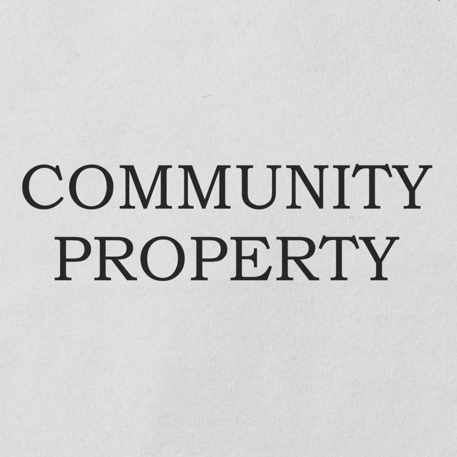 Community Property Rubber Stamp imprint on white paper, showing clear and bold text in black ink.