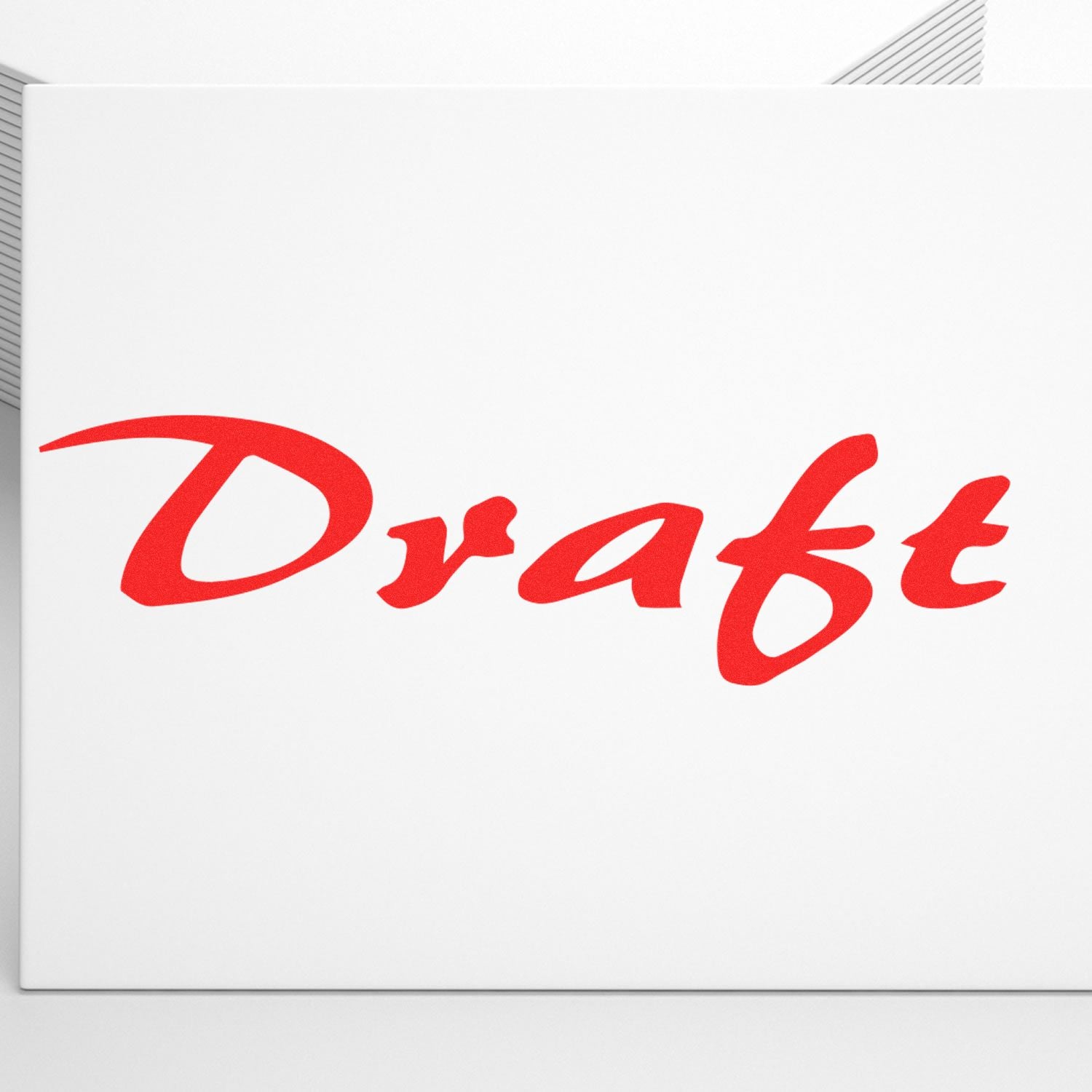 Red Draft text stamped on white paper using the Cursive Draft Rubber Stamp, with a clean and modern design.