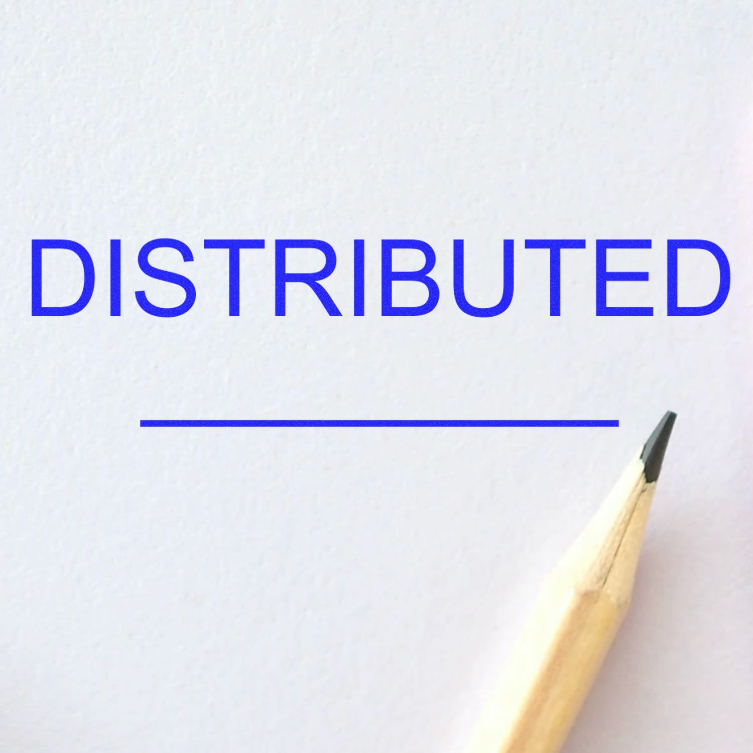 Self Inking Distributed Stamp With A Line imprint on white paper, blue text 'DISTRIBUTED' above a line, with a pencil tip visible.