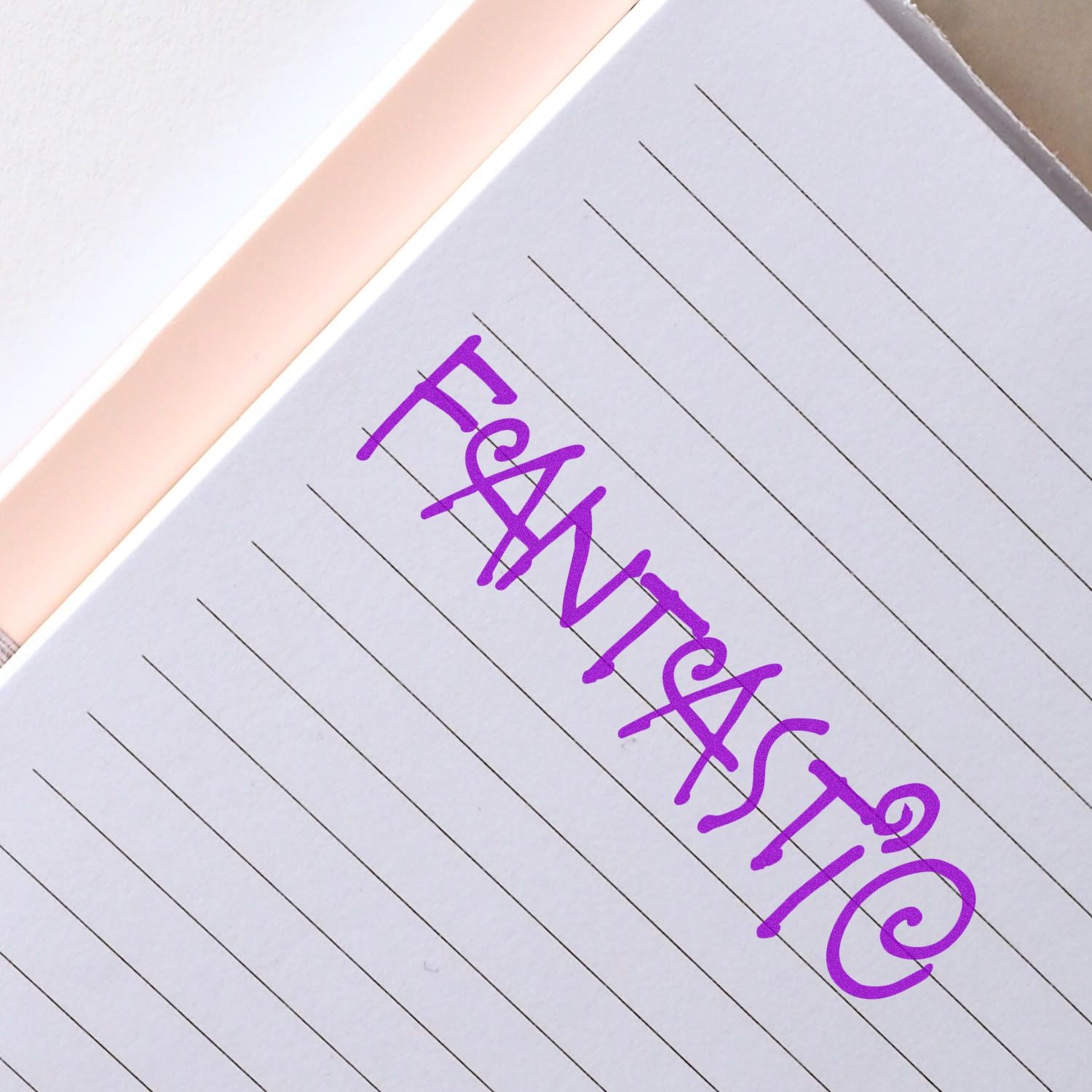 Fantastic Rubber Stamp in purple ink on a lined notebook page, showcasing the clear and bold imprint of the stamp.