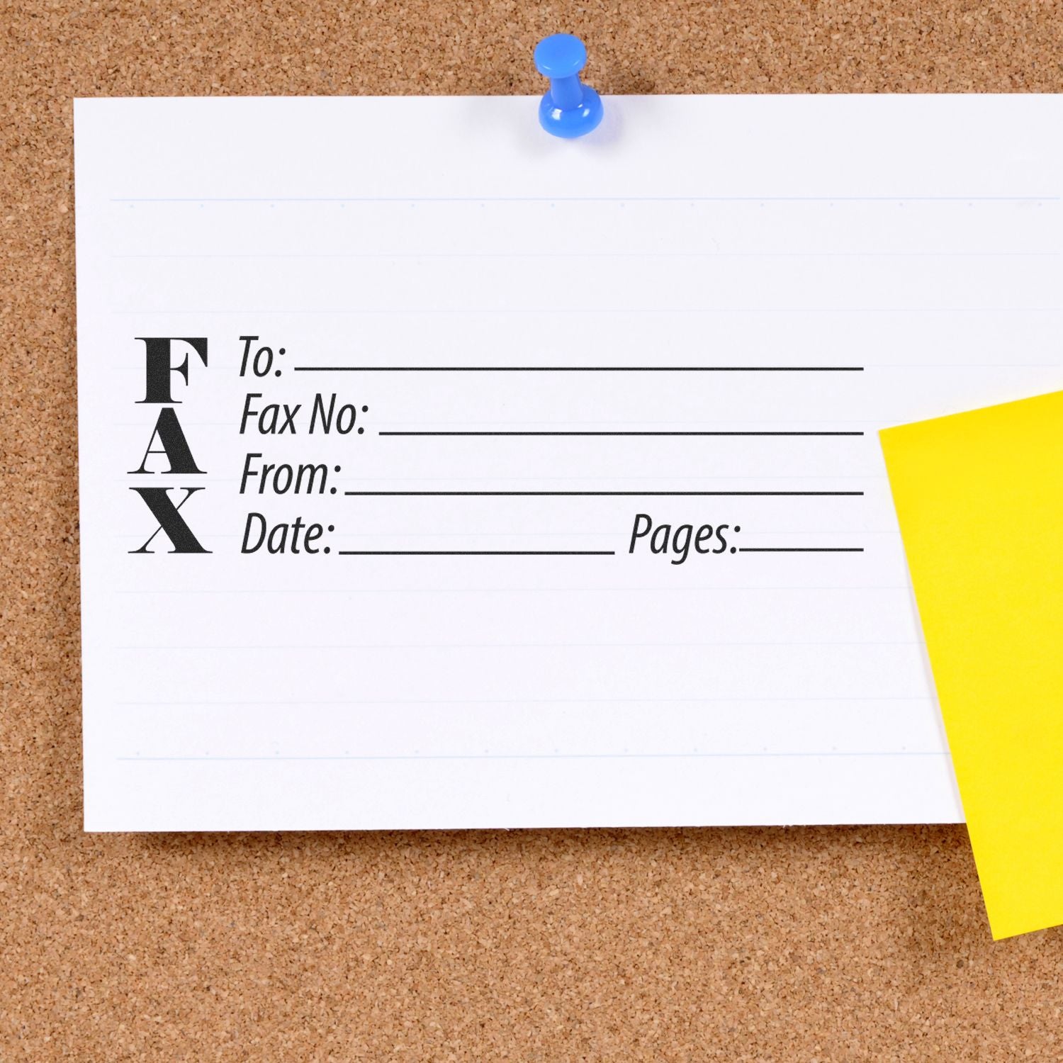 Large Self Inking Fax Stamp used on a white paper pinned to a corkboard with a blue pushpin and a yellow sticky note beside it.