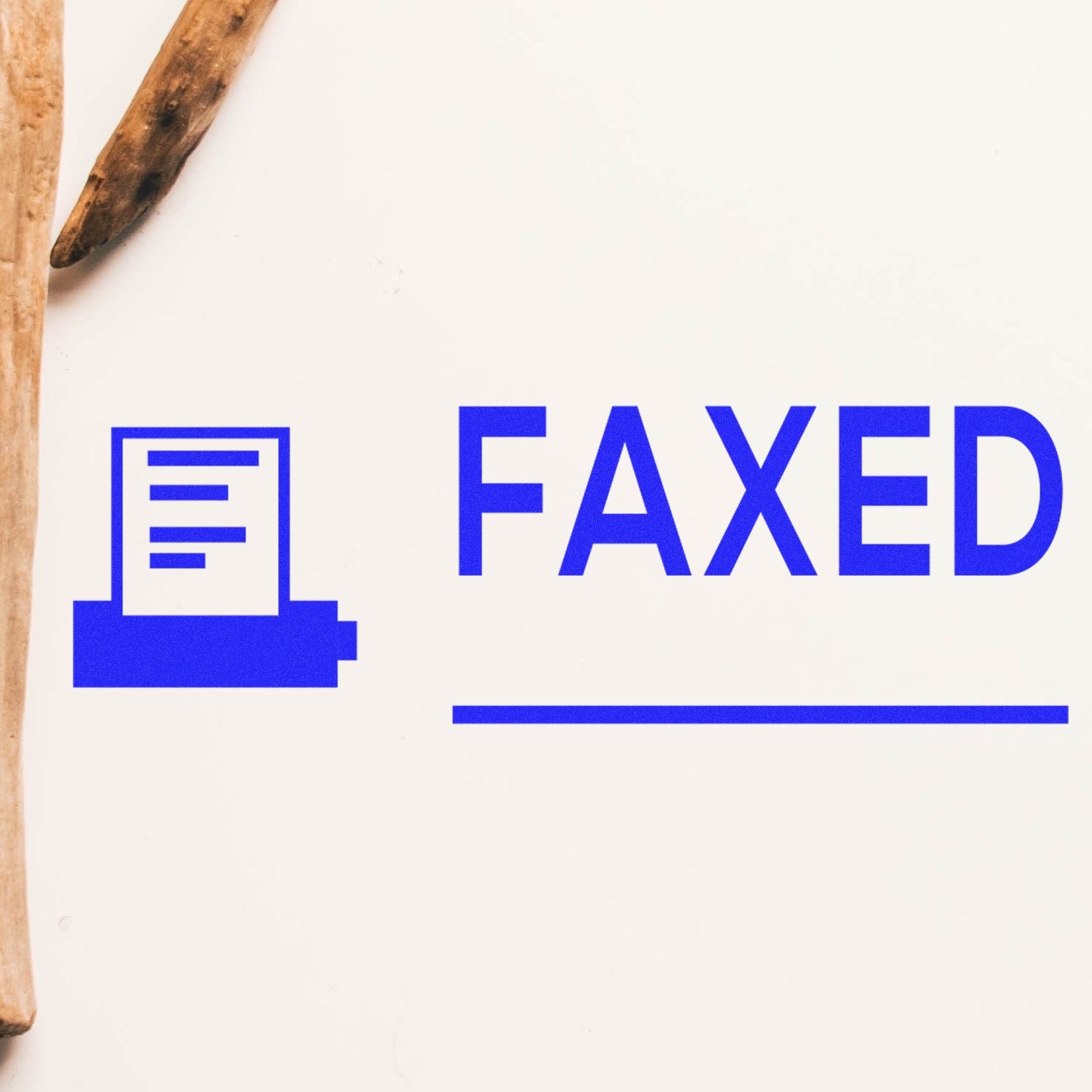 Self Inking Faxed with Machine Stamp in blue ink on white paper, showing a fax icon and the word FAXED next to wooden sticks.