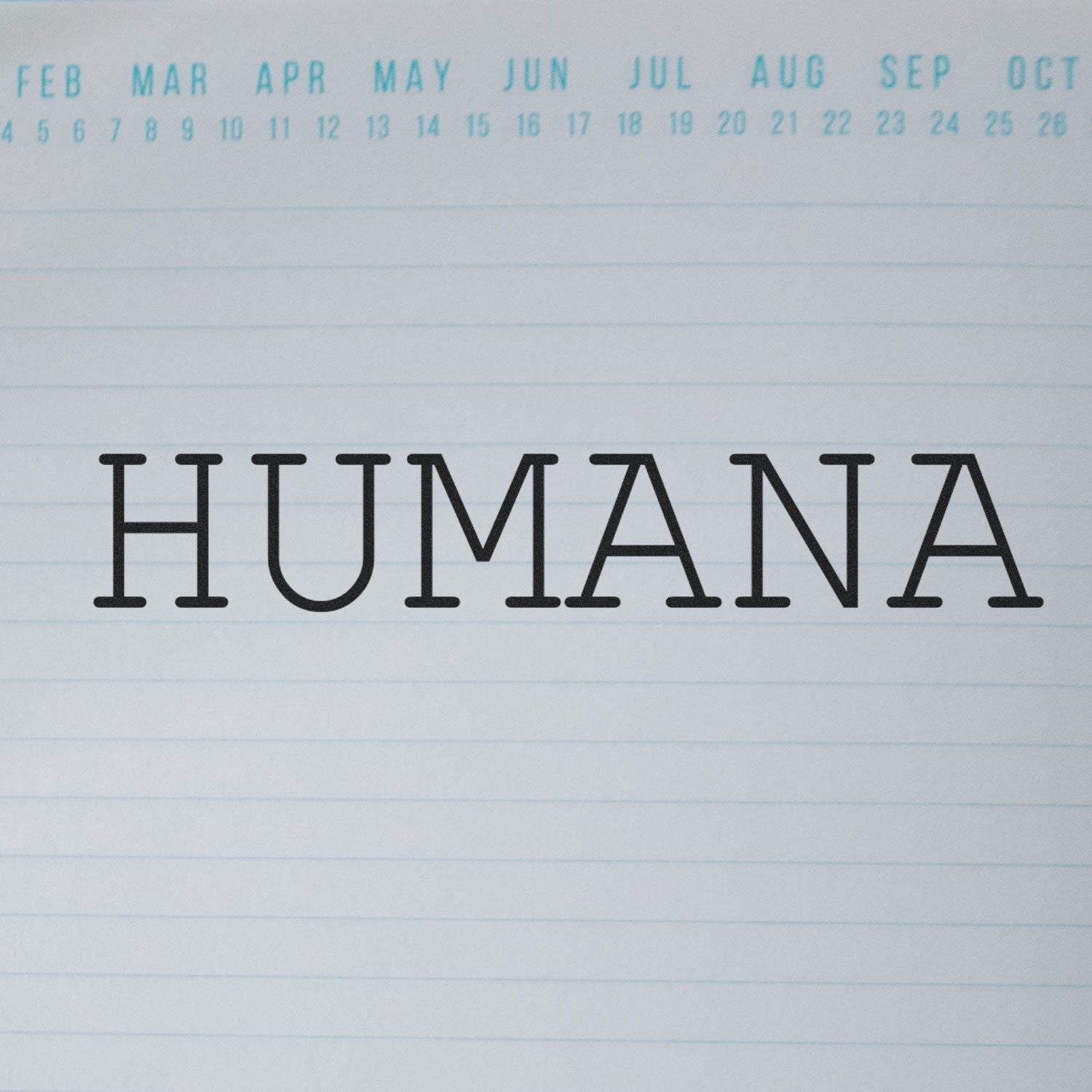 Large Self Inking Humana Stamp imprint on lined paper with a calendar header showing months from February to October.