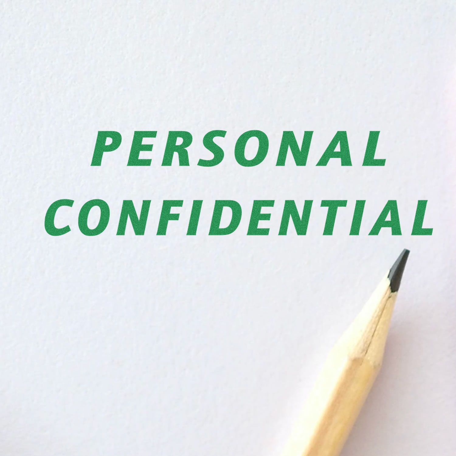 Stamped text 'PERSONAL CONFIDENTIAL' in green ink on white paper with a pencil tip visible. Product: Large Italic Personal Confidential Rubber Stamp.