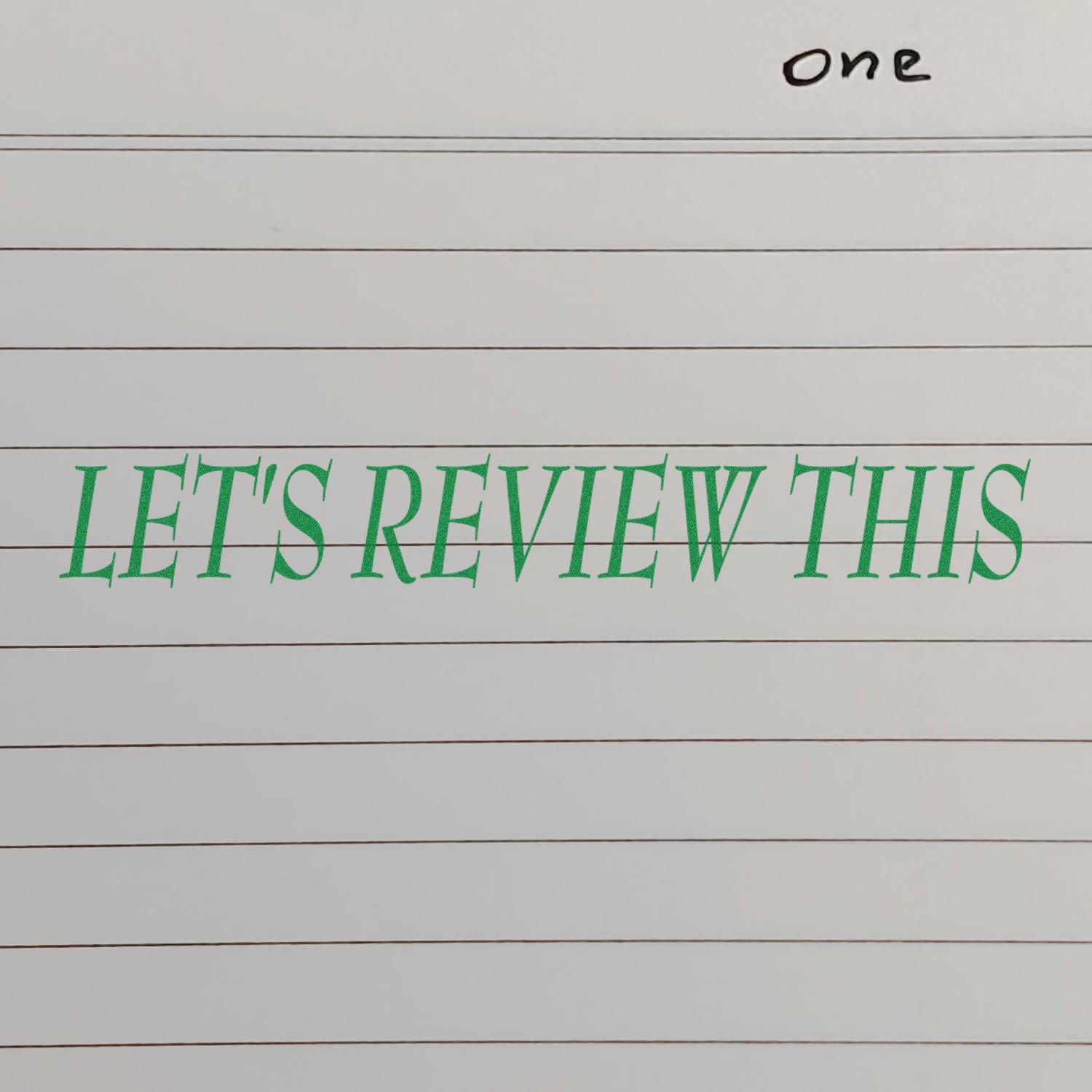 Large Self Inking Lets Review This Stamp in green ink on lined paper, with the word one handwritten at the top right corner.