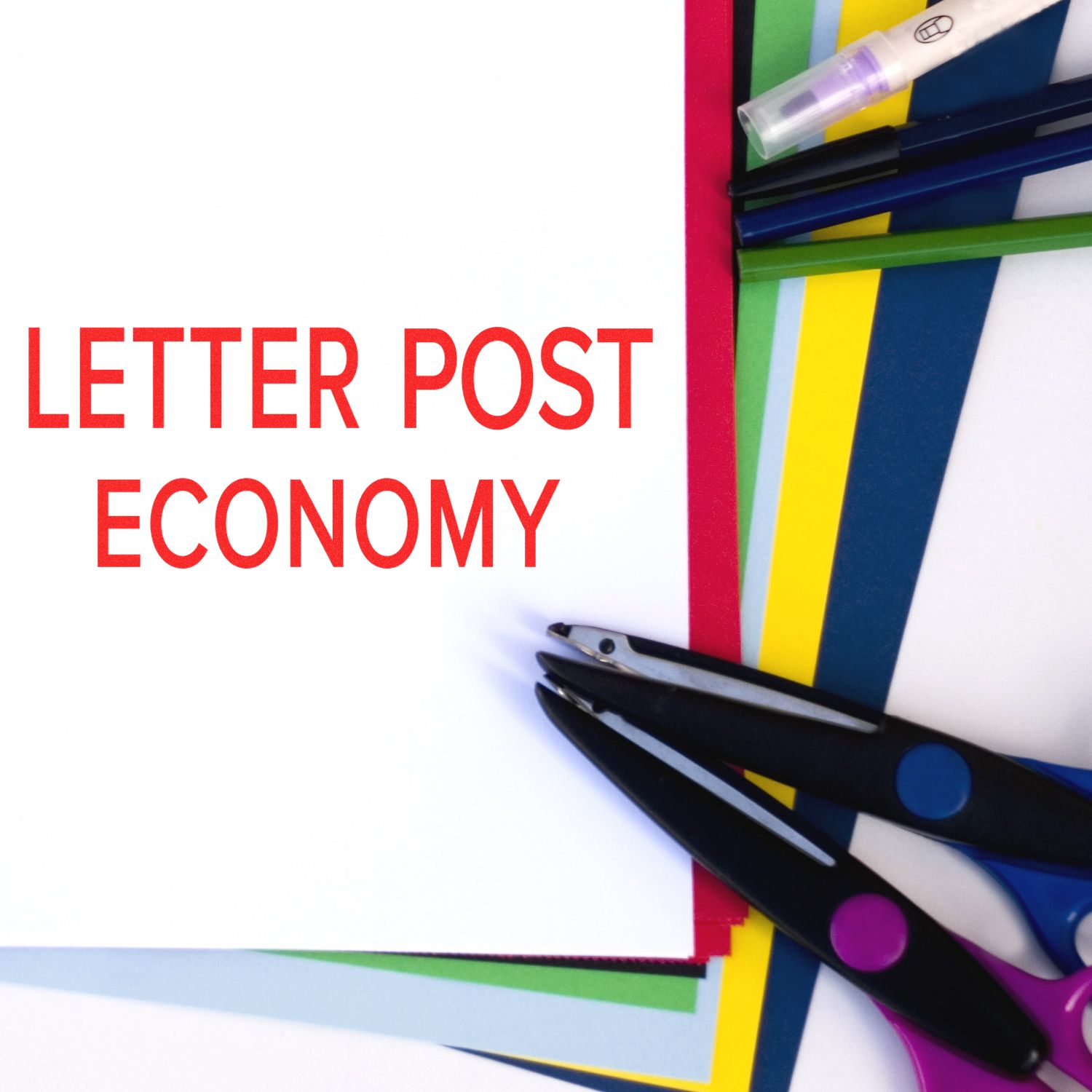 Colorful stationery with a Slim Pre-Inked Letter Post Economy Stamp on white paper, surrounded by scissors and pens.