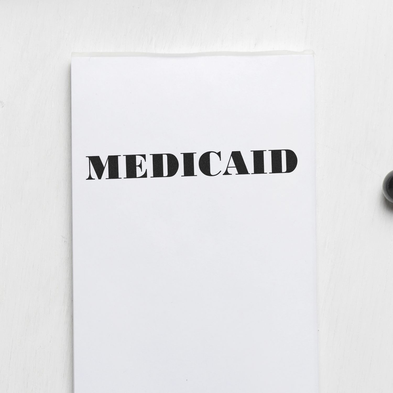 Large Pre-Inked Medicaid Stamp Lifestyle Photo