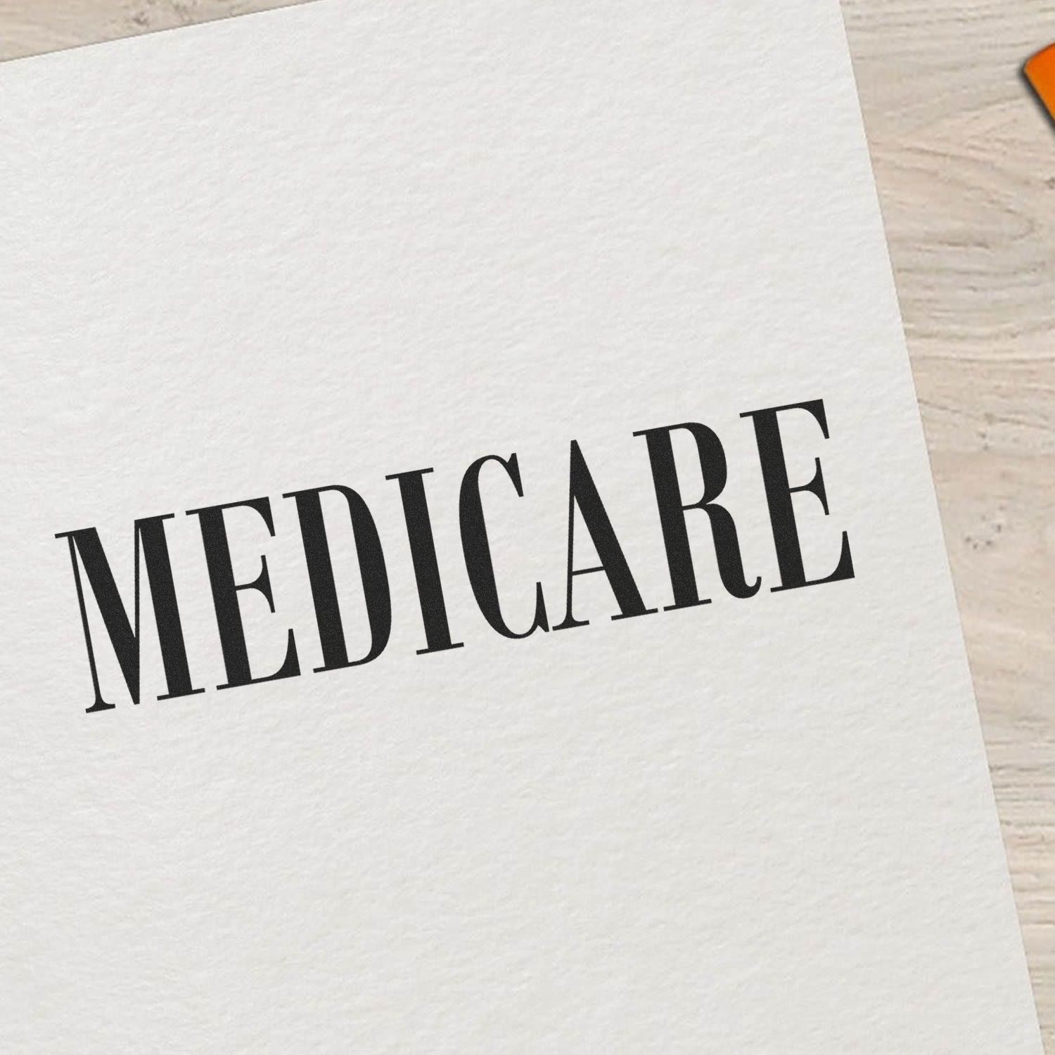 Medicare Rubber Stamp imprint on white paper, showing the word 'MEDICARE' in bold black letters.