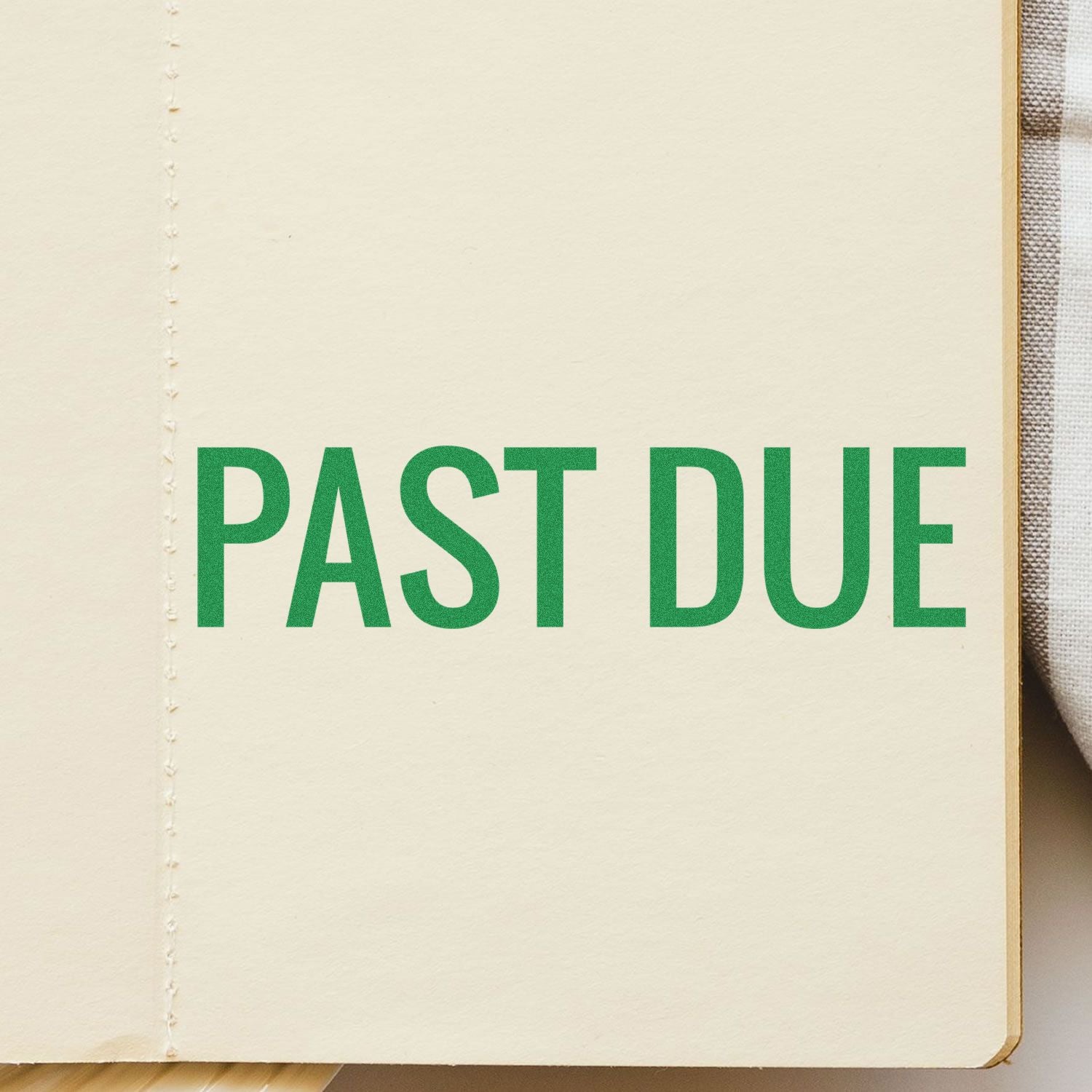 Large Narrow Bold Past Due Rubber Stamp in green ink on a beige paper background.