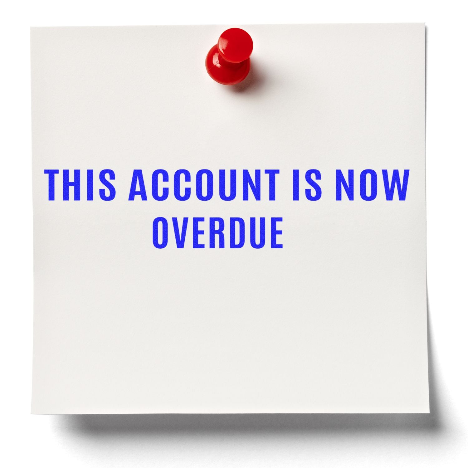 A red pushpin holds a white note with THIS ACCOUNT IS NOW OVERDUE stamped in blue using the Large Self Inking Narrow This account is now overdue Stamp.