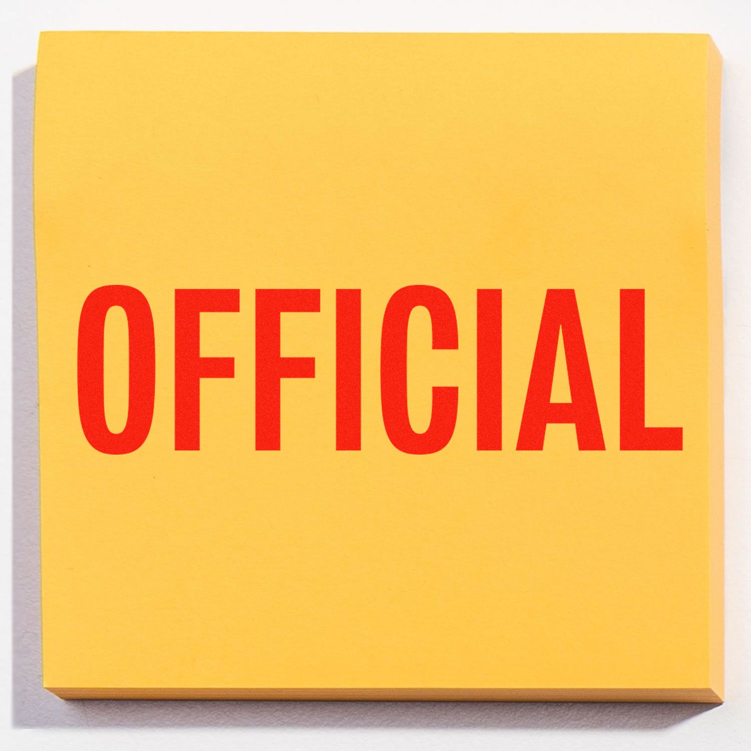 Large Self Inking Official Stamp imprint on a yellow sticky note with the word OFFICIAL in bold red letters.