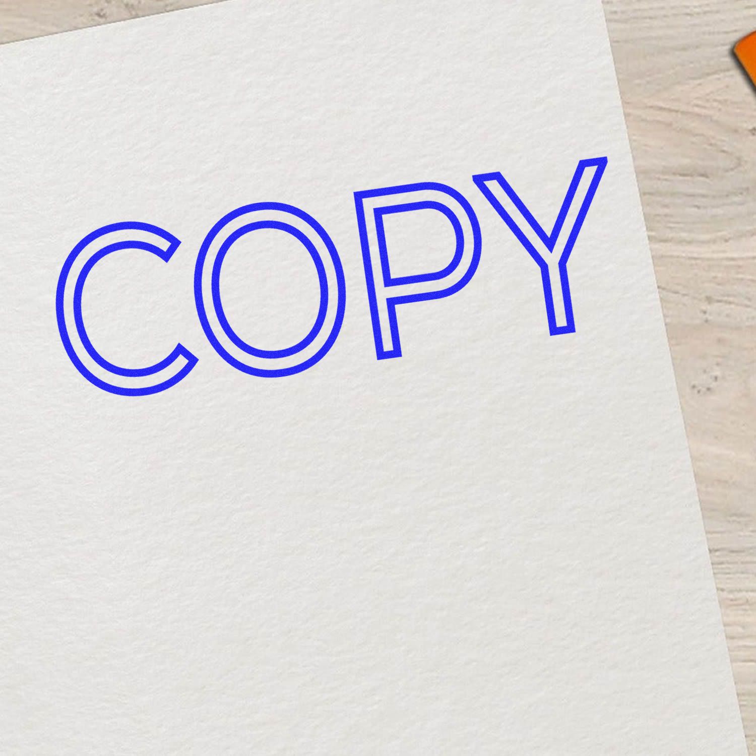 Large Pre-Inked Outline Copy Stamp in blue ink on white paper, showing the word 'COPY' in bold outline letters.