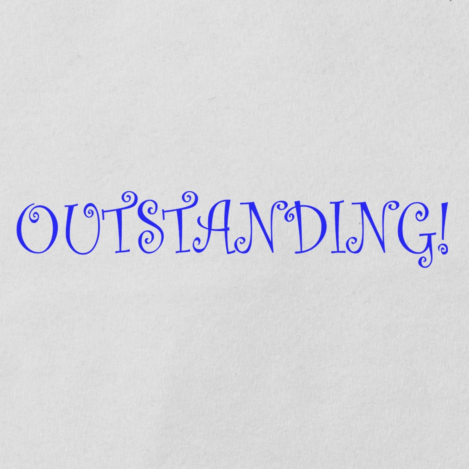 Blue 'Outstanding!' rubber stamp impression on white paper, showcasing the decorative and bold design of the stamp.