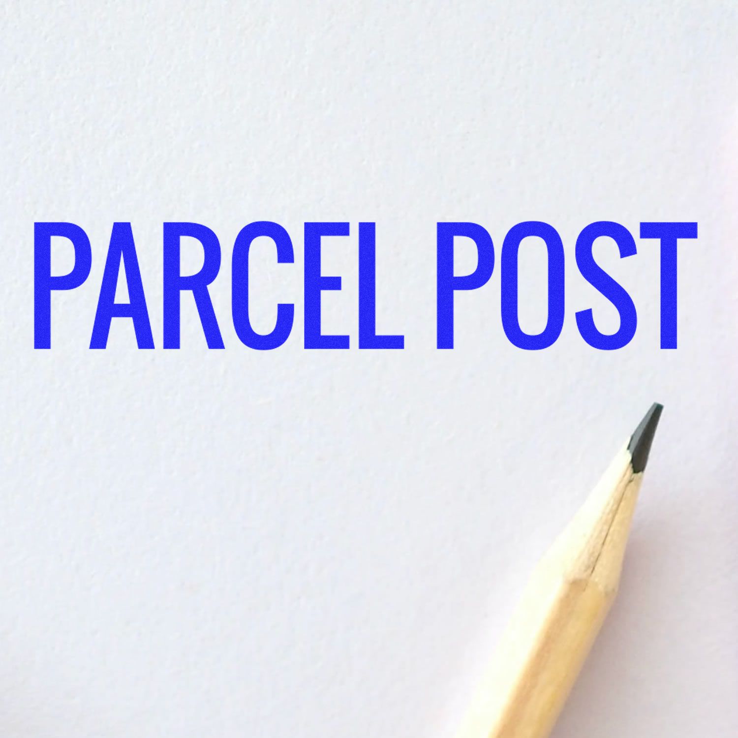 Parcel Post Rubber Stamp in blue ink on white paper with a sharpened pencil tip visible at the bottom right corner.