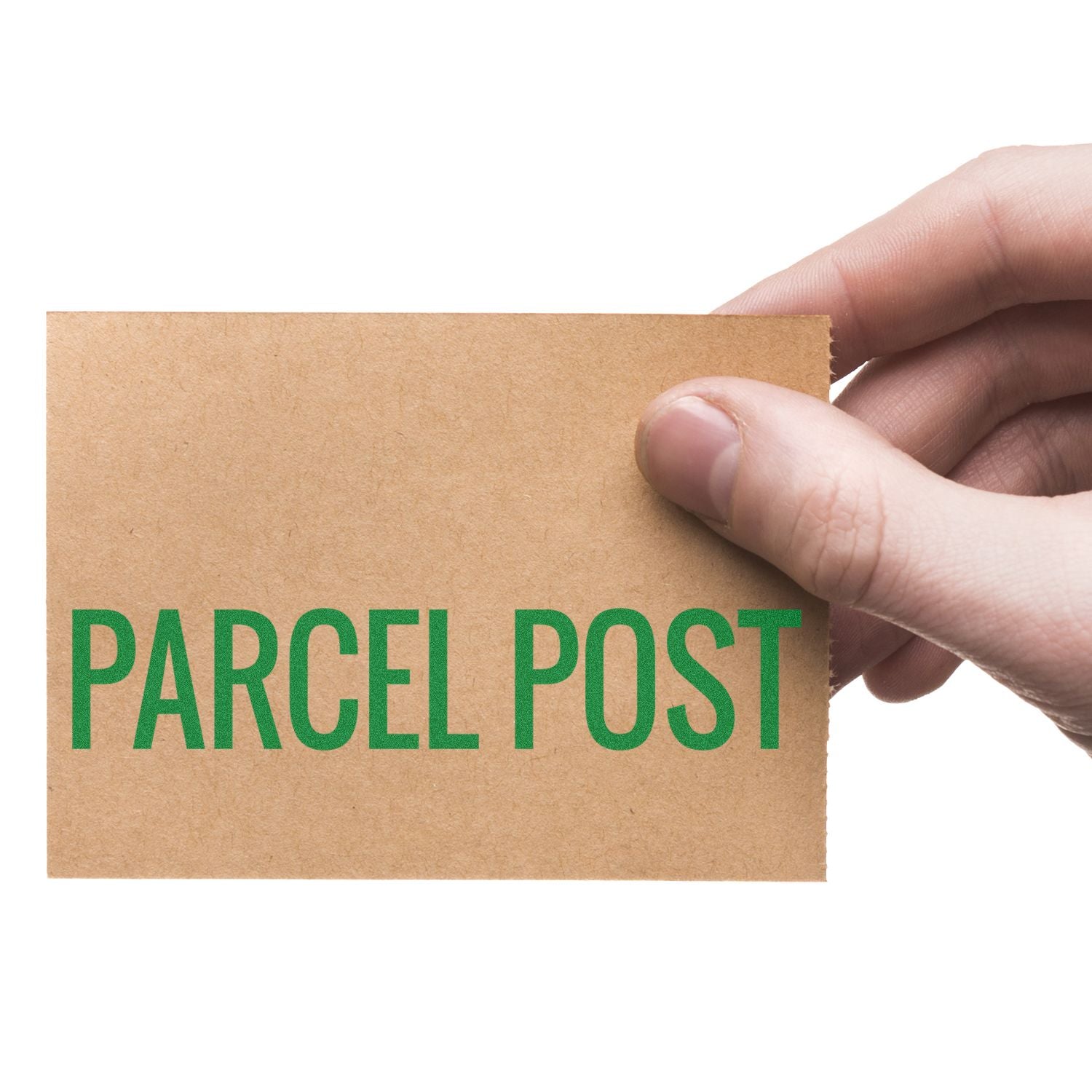 Hand holding a brown card with green Parcel Post text, stamped using a Parcel Post Rubber Stamp.