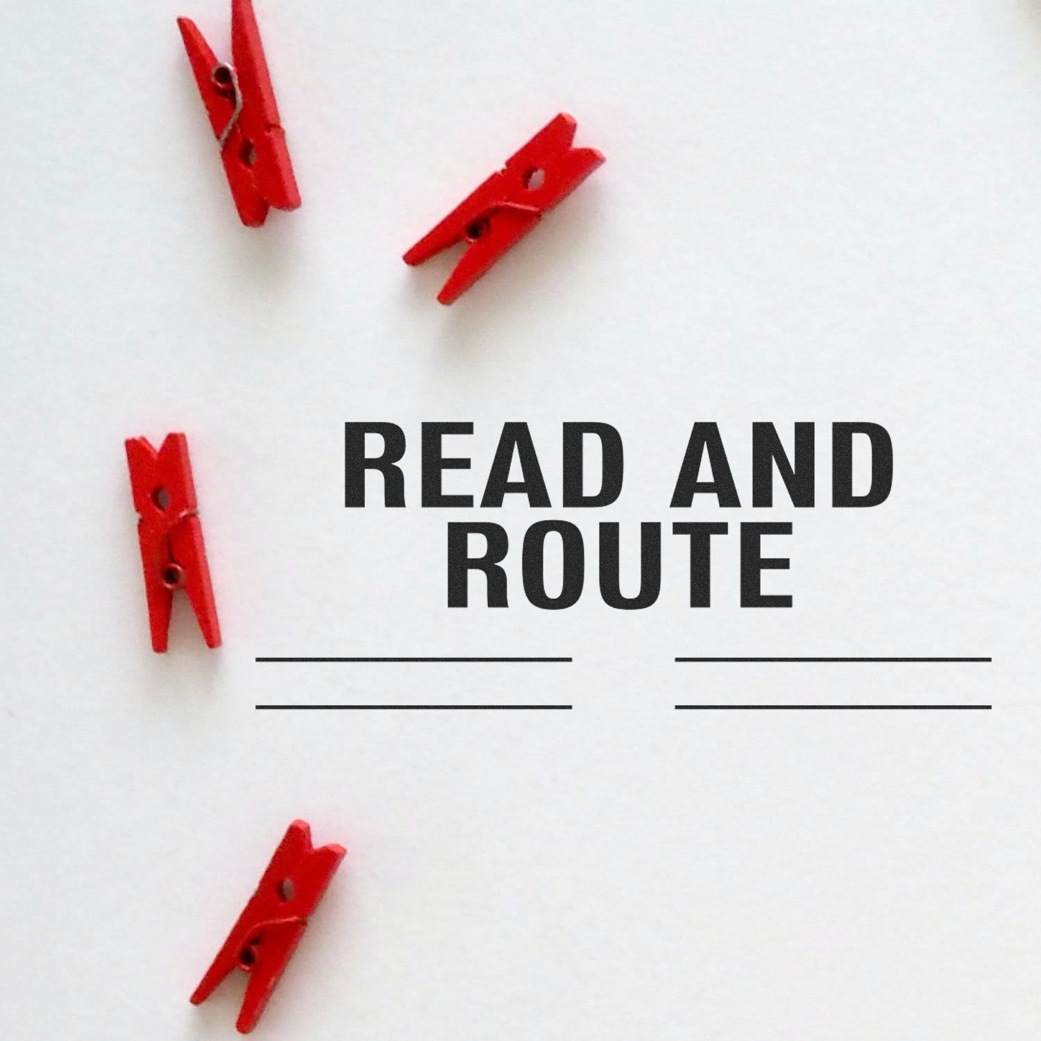 Read and Route with Lines Rubber Stamp in use, featuring red clothespins on a white background.