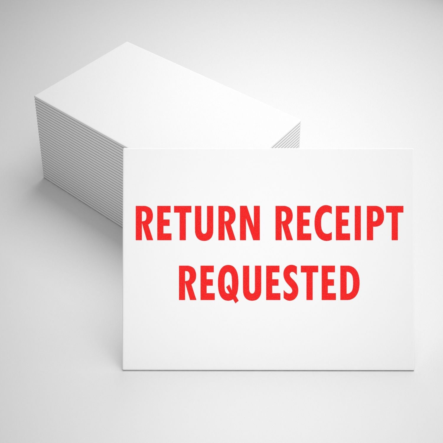 A stack of white cards stamped with RETURN RECEIPT REQUESTED in red using the Self Inking Return Receipt Requested Stamp.