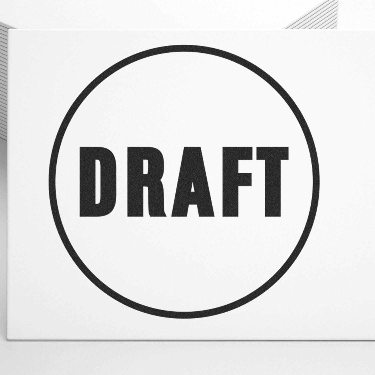 Round Draft Rubber Stamp on white paper, featuring the word DRAFT in bold black letters inside a black circle.