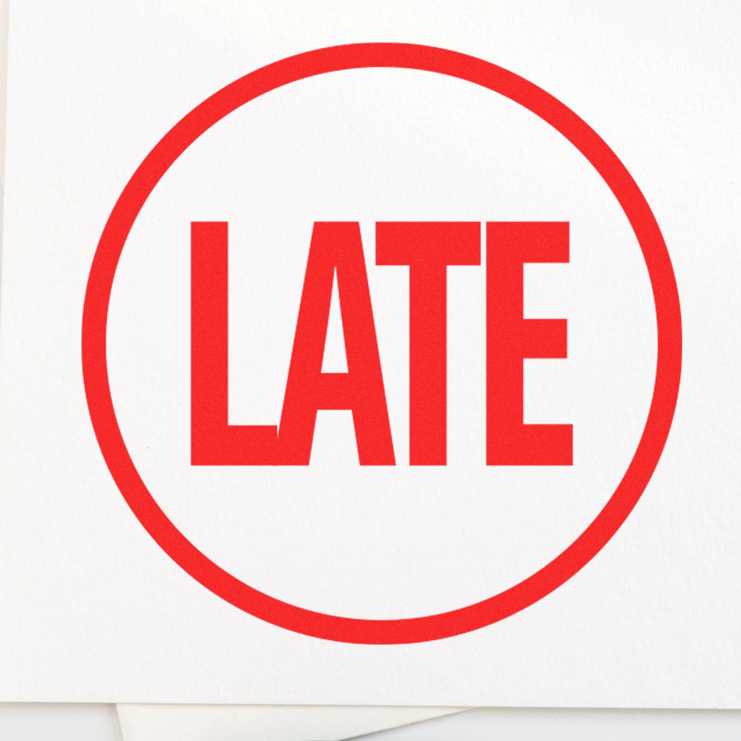 Red LATE text inside a circle on a white background, representing a round late rubber stamp.