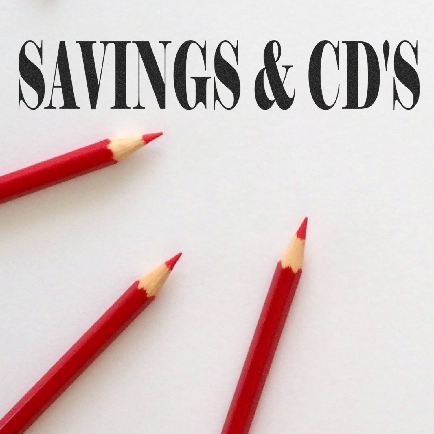 Slim Pre-Inked Savings CDs Stamp on white paper with three red pencils pointing towards the text 'SAVINGS & CD'S'.