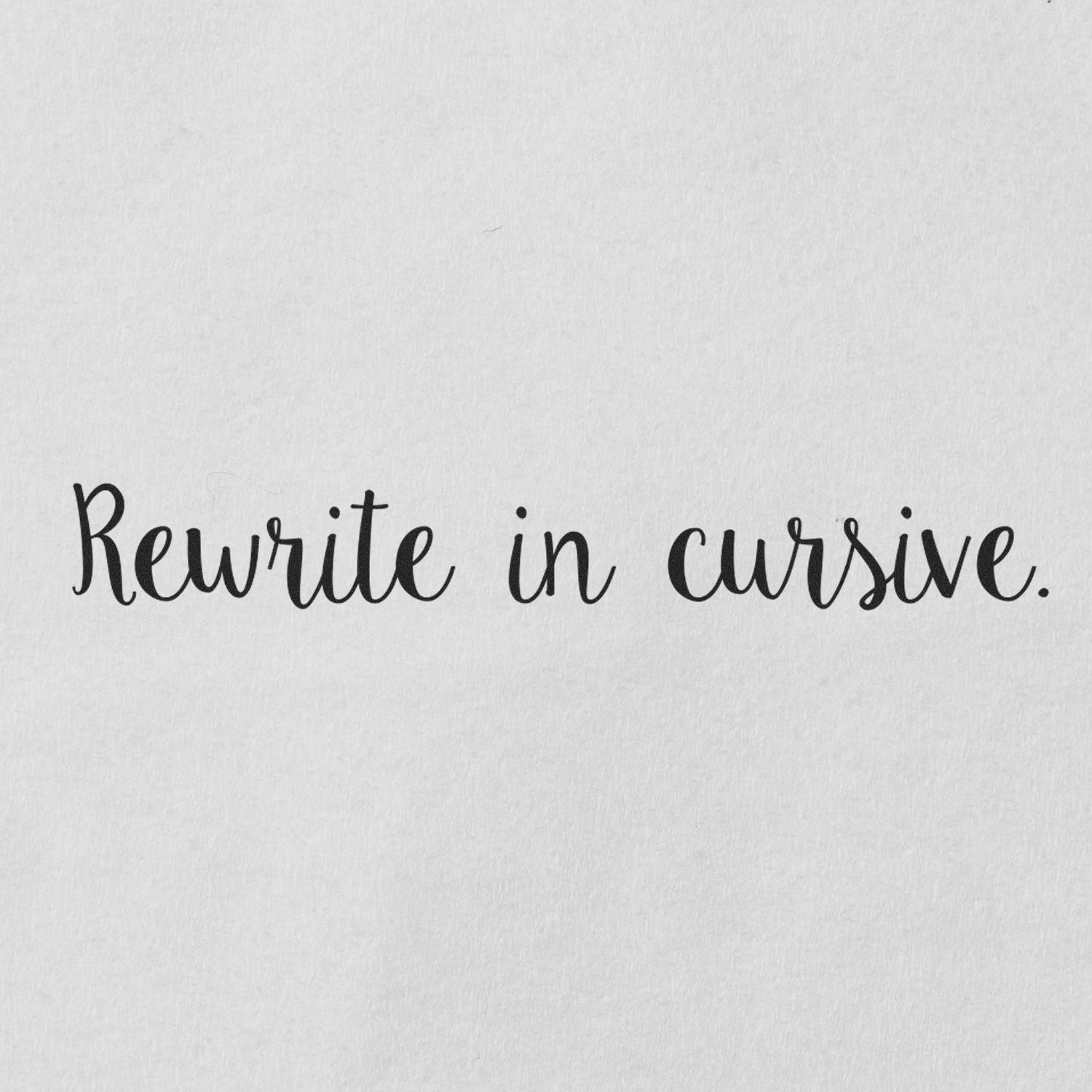 Script Rewrite in Cursive Rubber Stamp imprint on white paper, displaying the text 'Rewrite in cursive' in elegant cursive font.