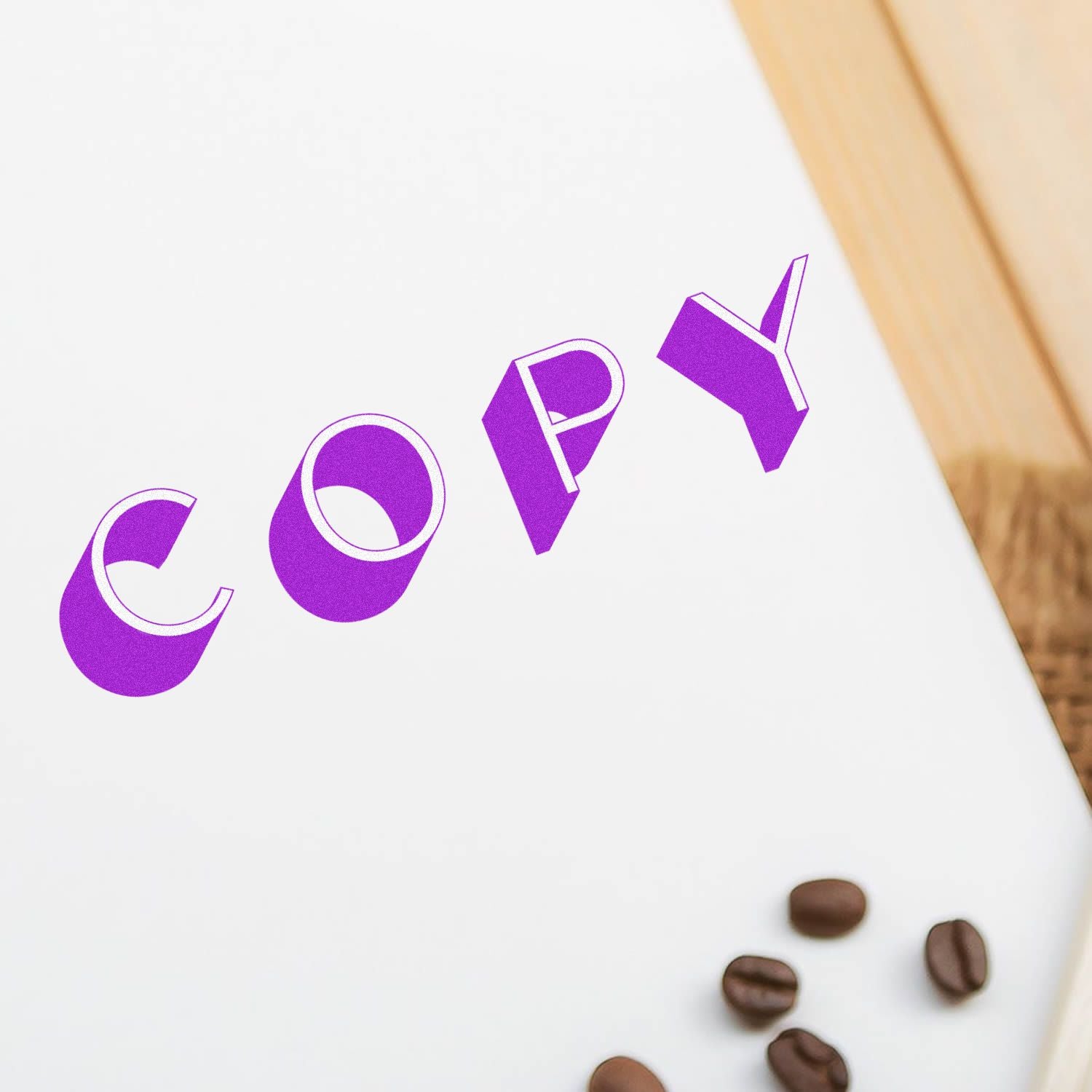 Shadow Copy Rubber Stamp imprint in purple ink on white paper, with coffee beans scattered nearby on a wooden surface.