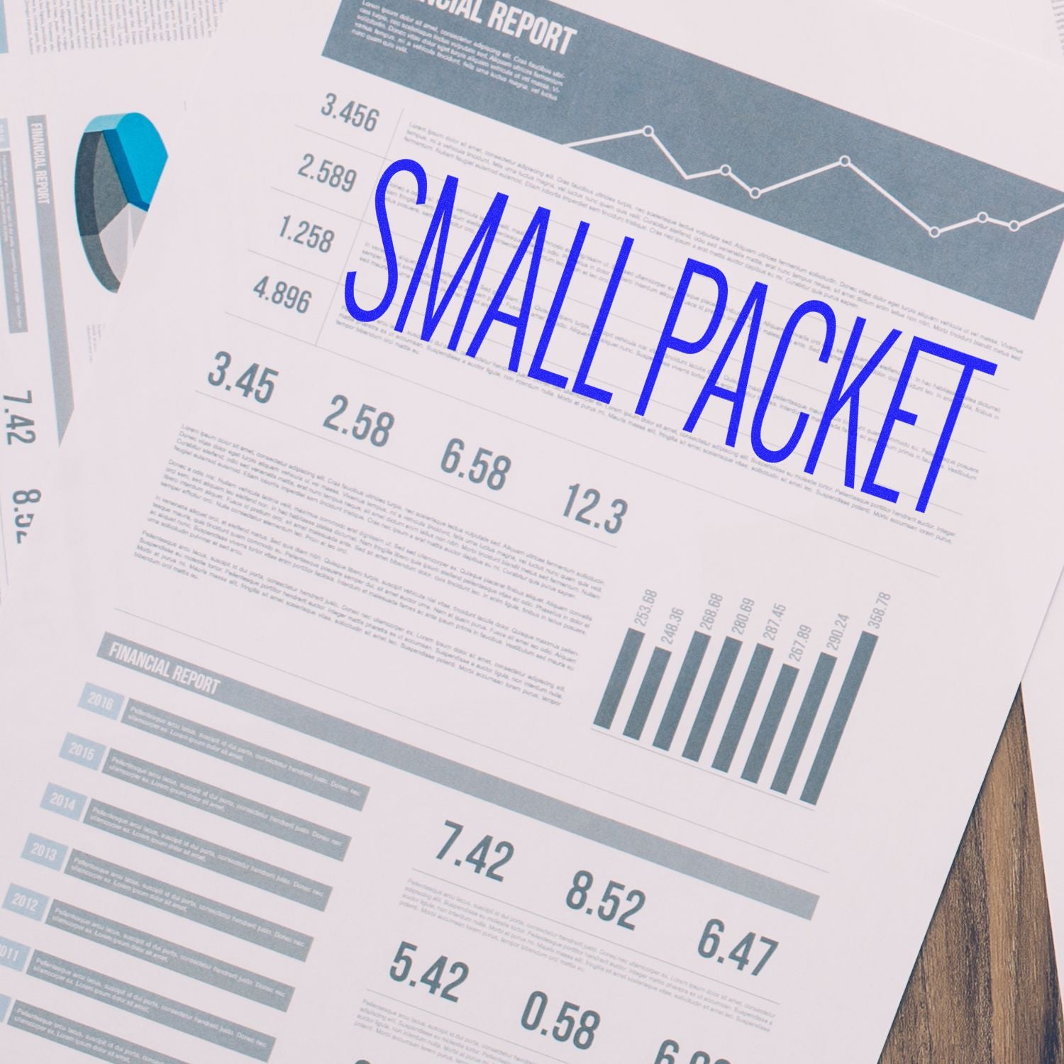 Slim Pre-Inked Small Packet Stamp used on financial report papers with graphs and charts in the background.