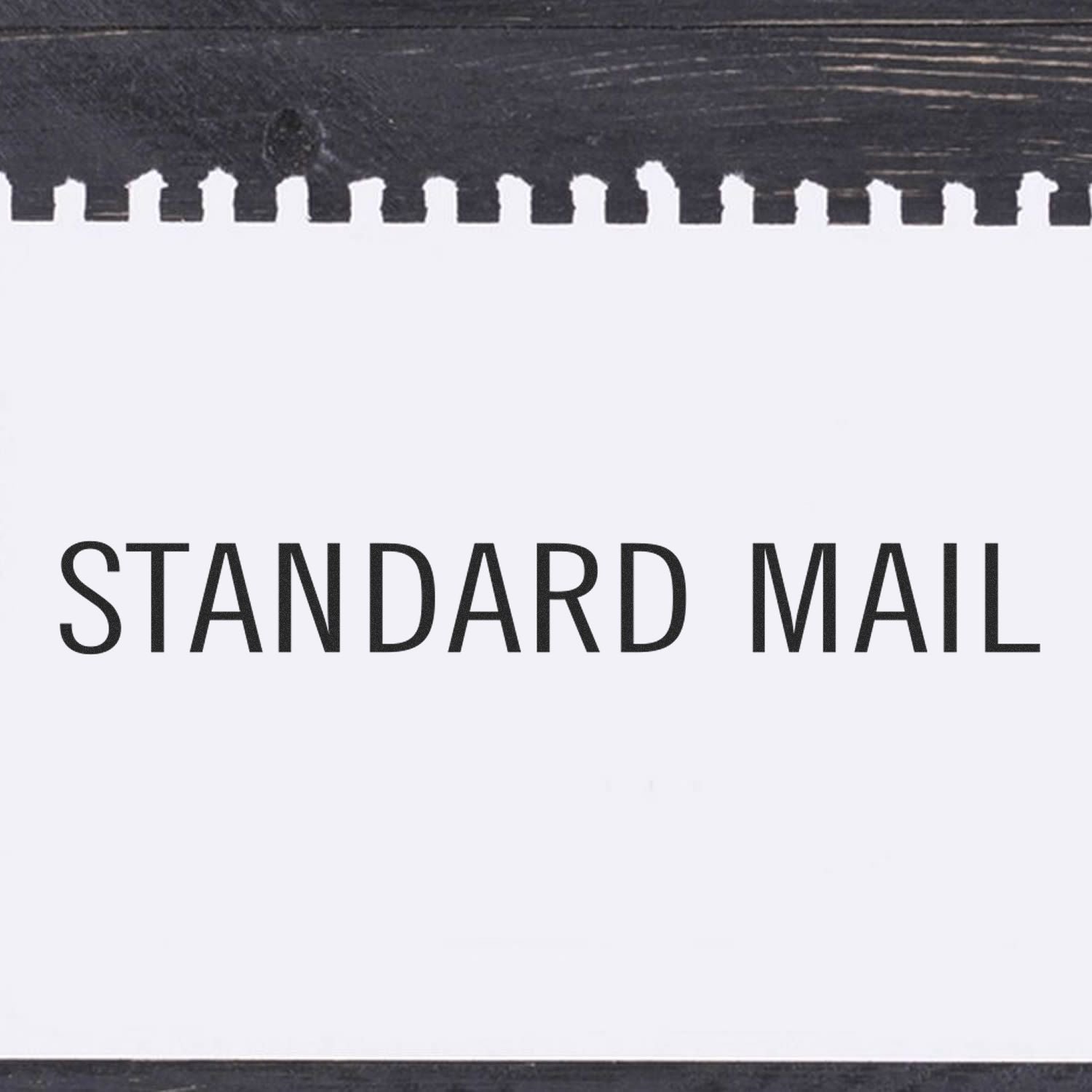 Standard Mail Rubber Stamp impression on a white sheet of paper with a black border at the top.